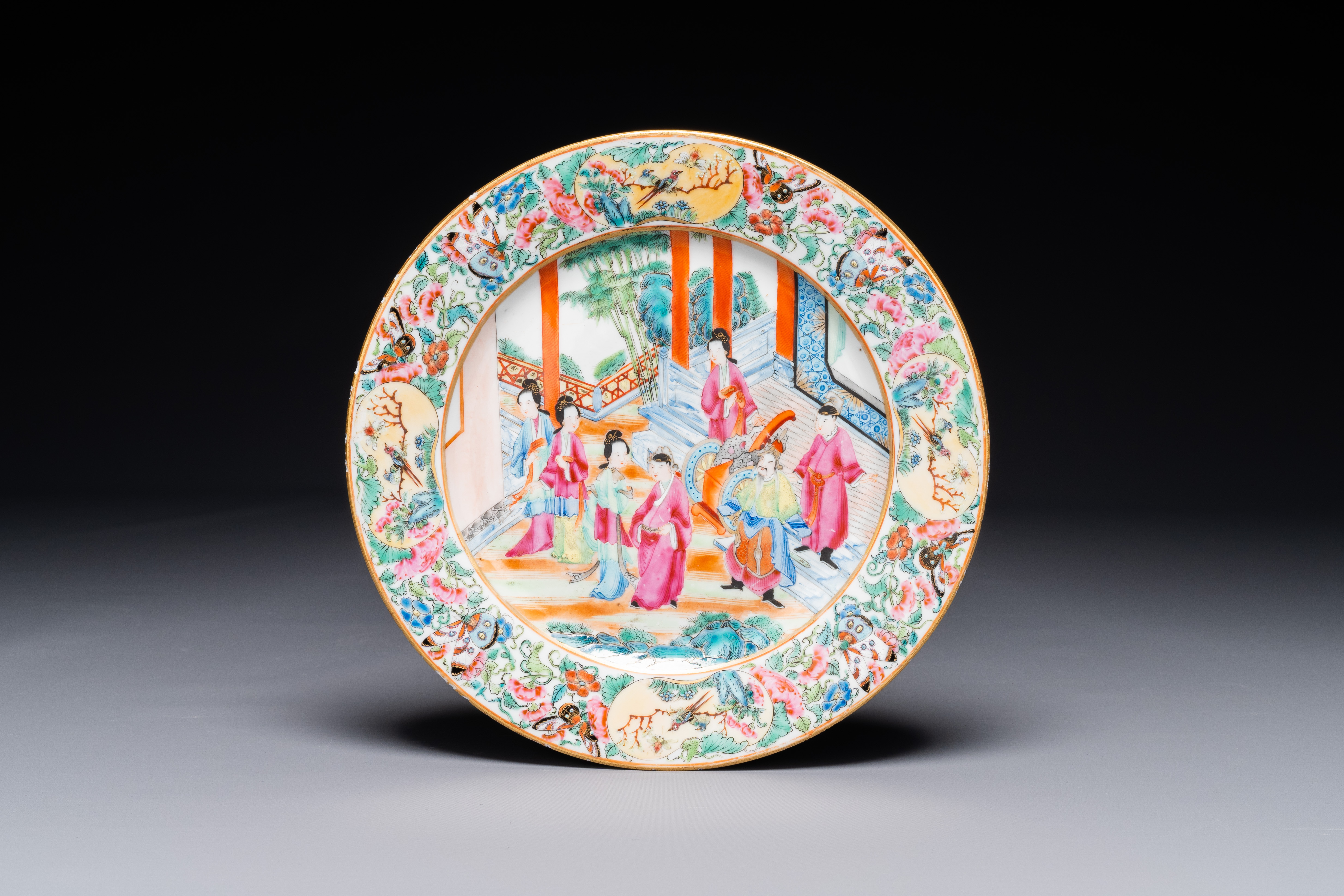 A Chinese Canton famille rose plate with narrative design, 19th C.