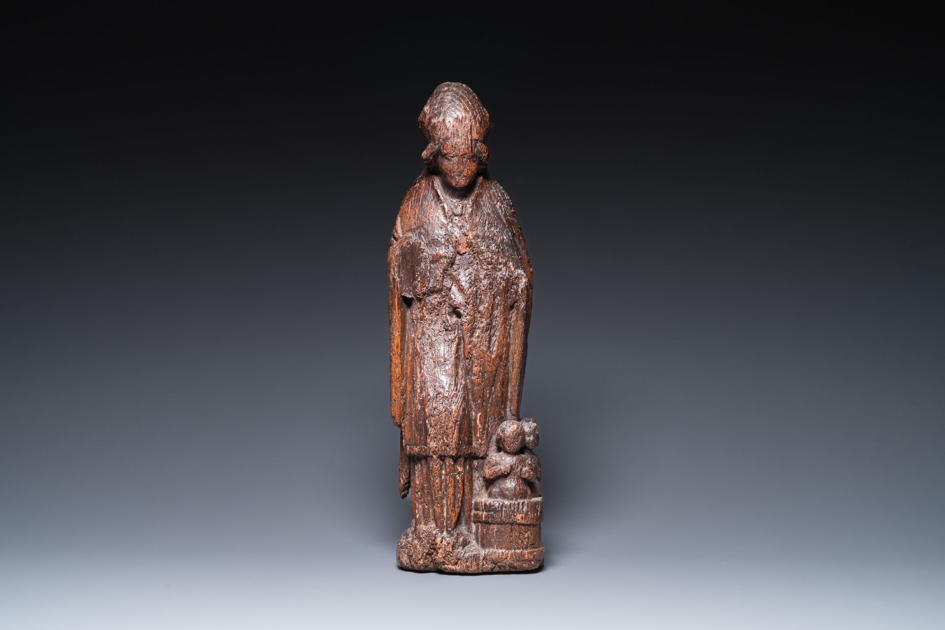 A Flemish carved oak sculpture of Saint Nicolas and the three boys in the salting-tub, 16th C. - Image 2 of 18