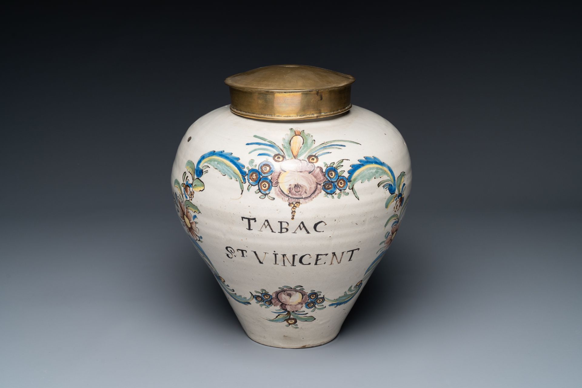 A polychrome pottery 'St. Vincent' tobacco jar, France, 18th century