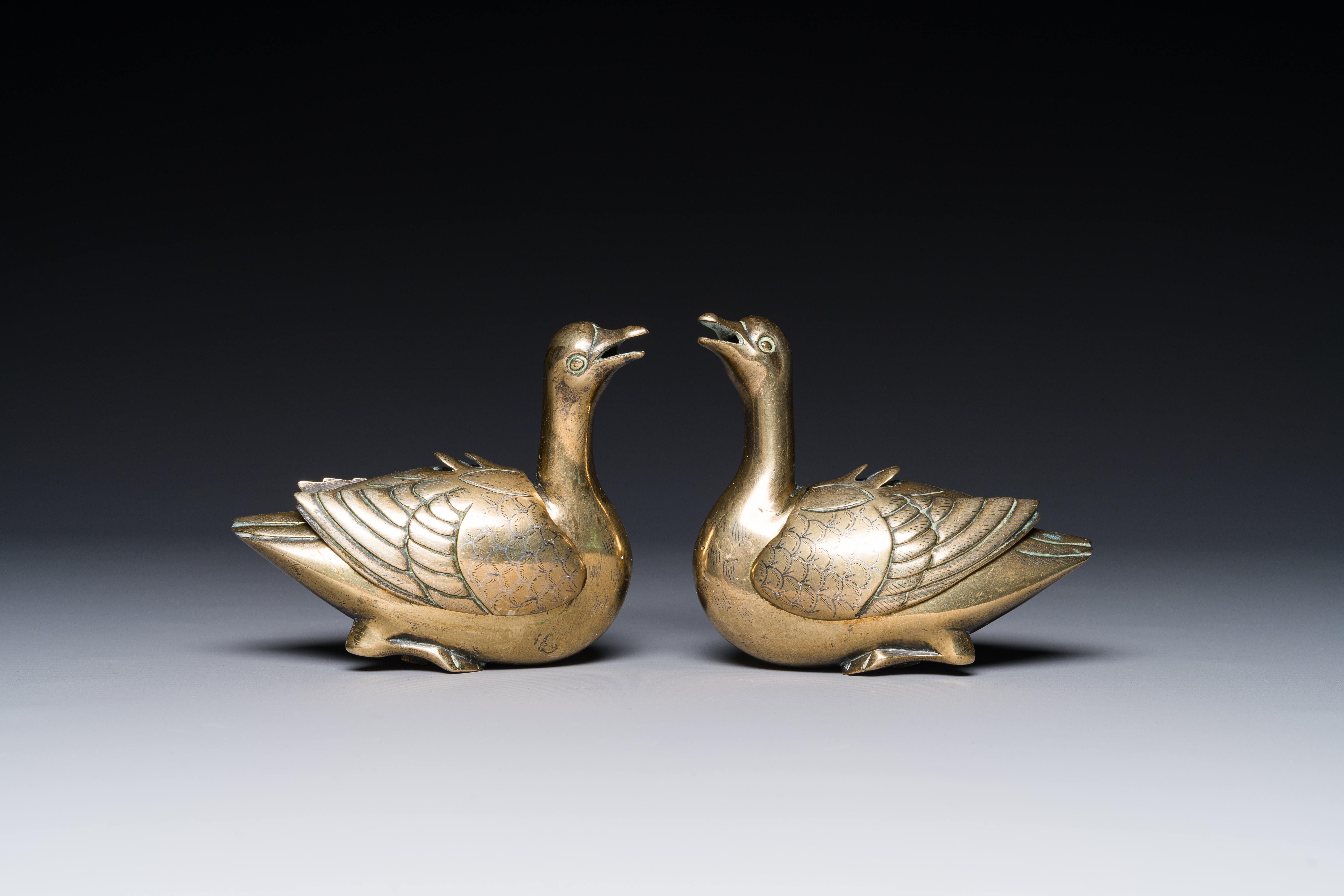 A pair of Chinese silver-inlaid bronze duck-form water droppers, Qing - Image 2 of 4