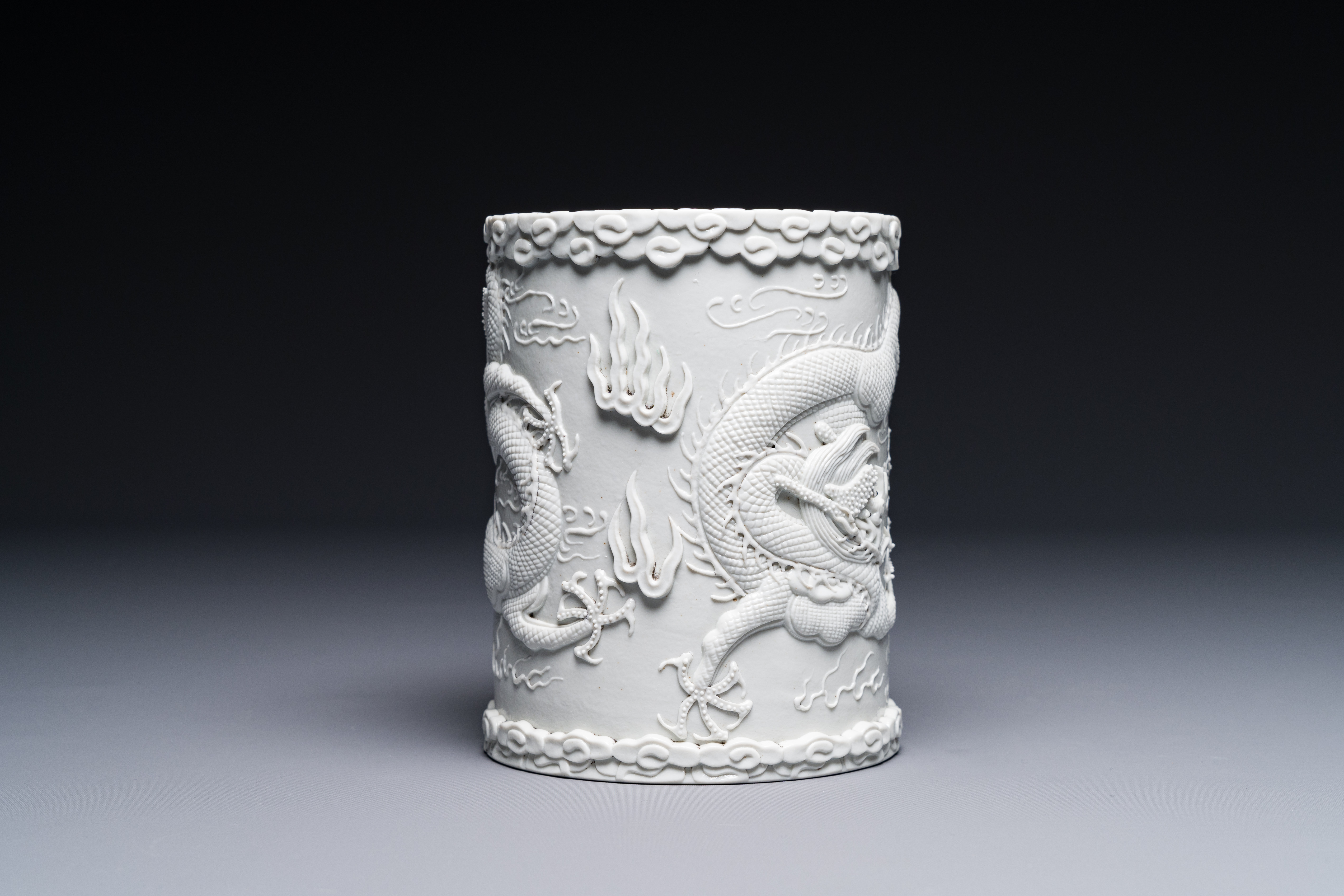 A Chinese monochrome white-glazed biscuit brush pot, signed Wang Bingrong çŽ‹ç‚³æ¦®, 19/20th C. - Image 5 of 7