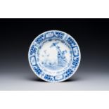 A Chinese blue and white plate with 'Parasol ladies' after Cornelis Pronk, Qianlong