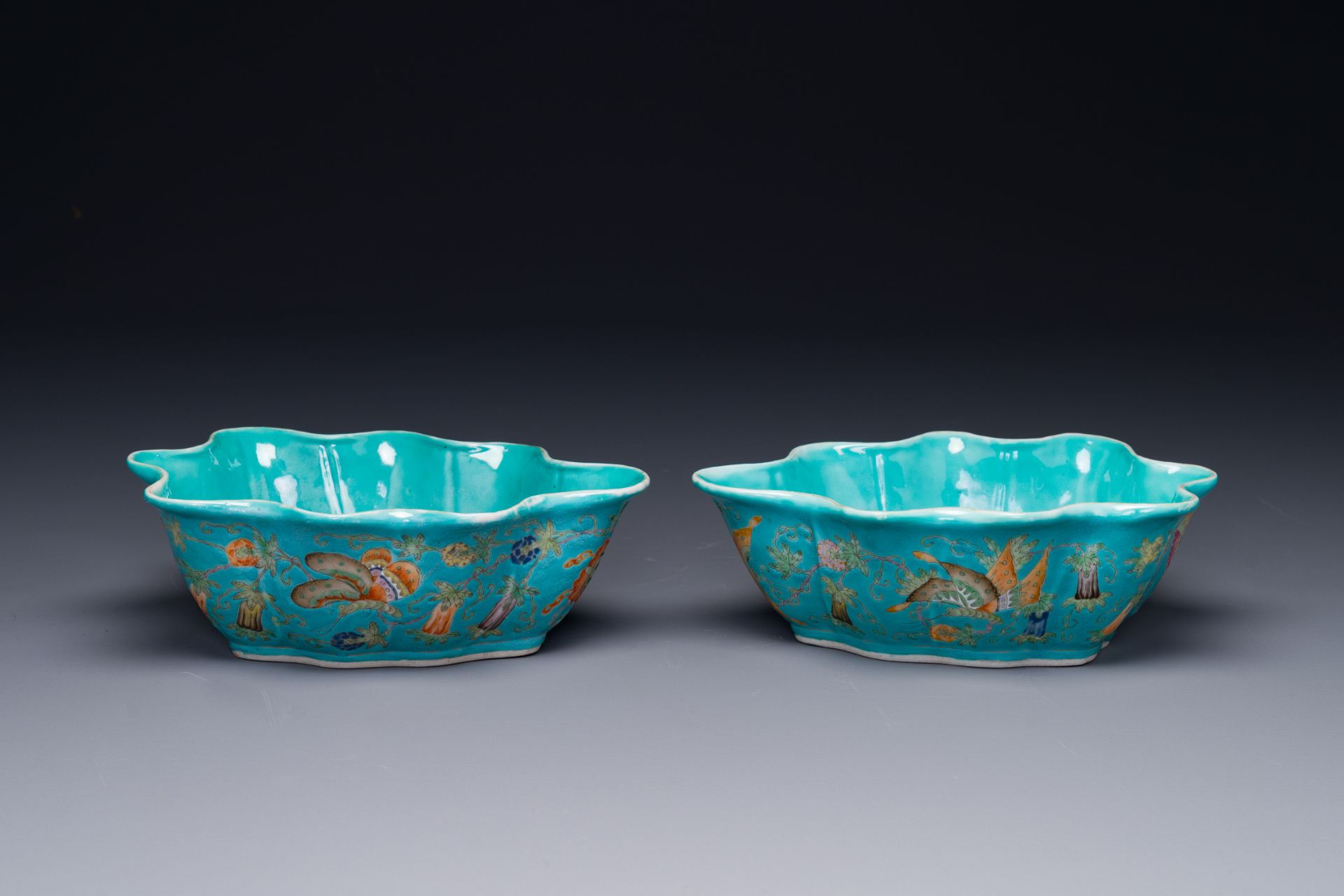 A pair of Chinese turquoise-ground famille rose leaf-shaped bowls with butterfly design, Jiaqing mar