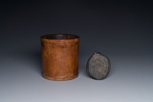A Chinese huanghuali wooden brushpot and a melon-shaped lacquer box and cover with '18 Luohan' relie