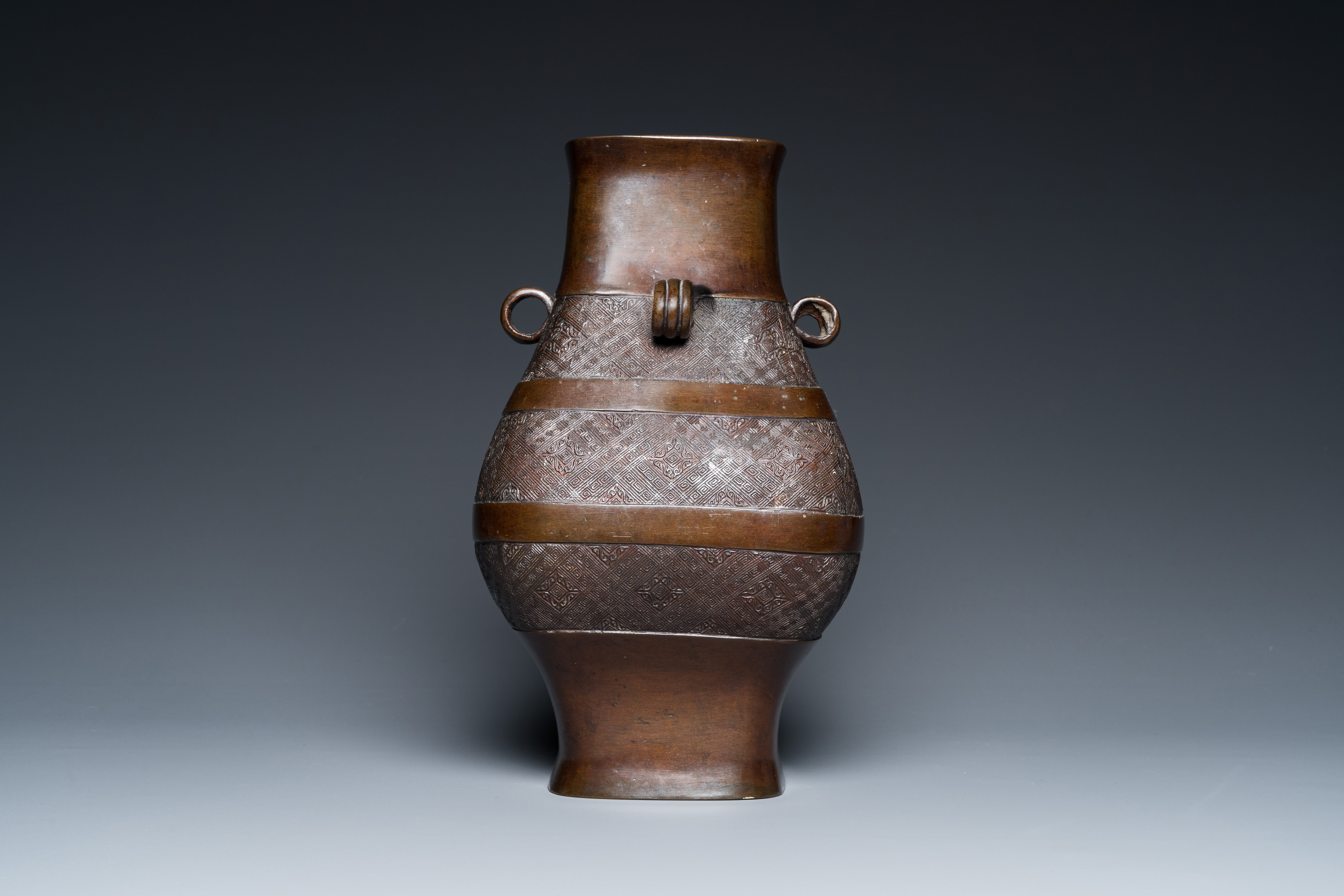 A Chinese archaistic bronze 'fanghu' vase, Ming - Image 11 of 24