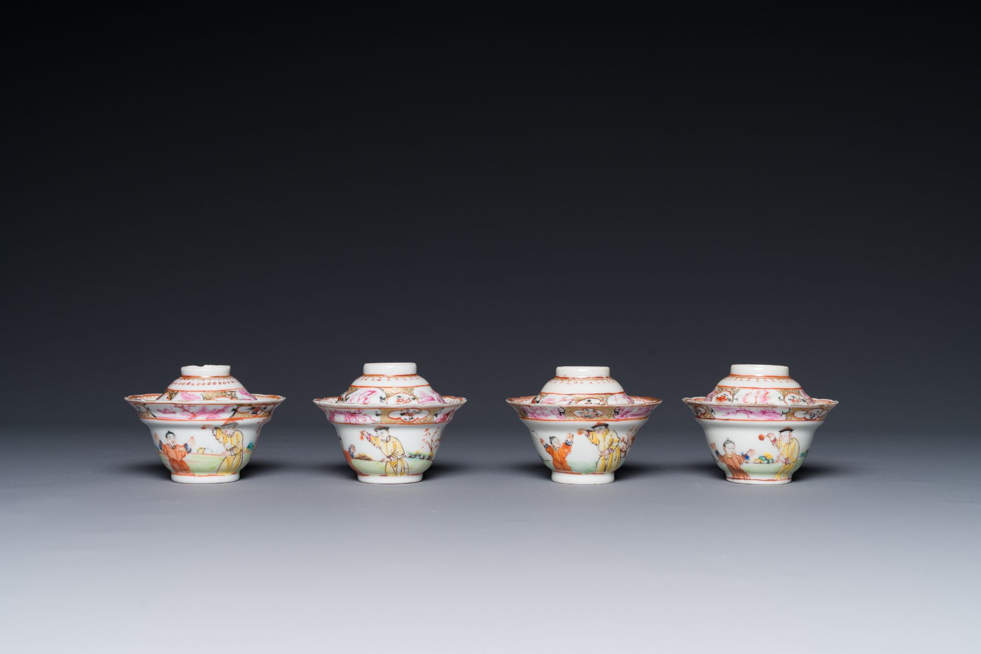 Six Chinese Canton famille rose 'mandarin subject' cups and saucers with four covers, Qianlong - Image 4 of 7