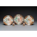 Three Chinese Canton famille rose armorial plates and a pair of egg cups for the Portugese market, G