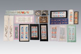 A varied collection of Chinese embroidered silk cloths, a fan-cover and rank badges, 19th C.