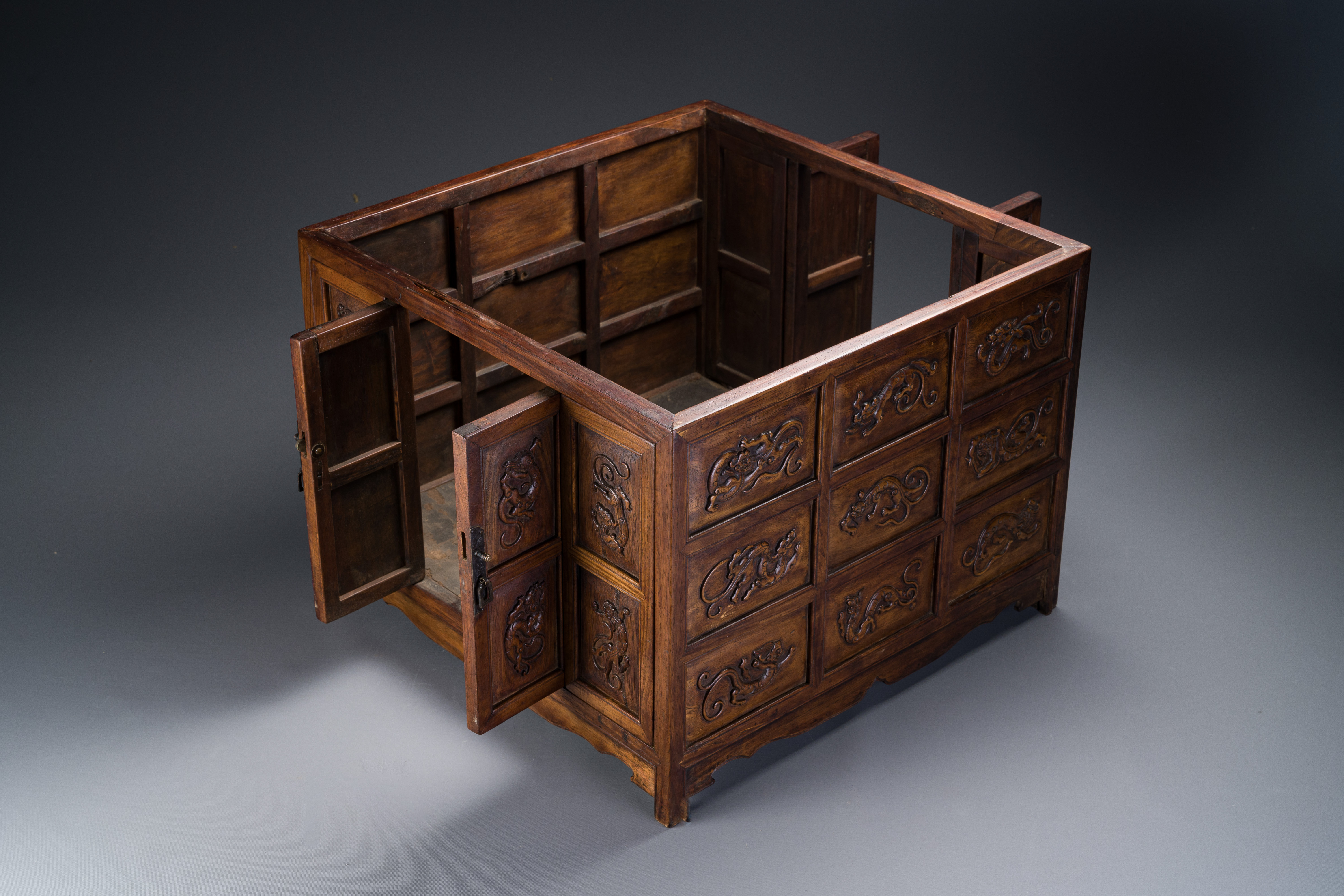 A rare Chinese huanghuali wood 'duo bao ge' cabinet of curiosities with chilong design, 18/19th C. - Image 8 of 14