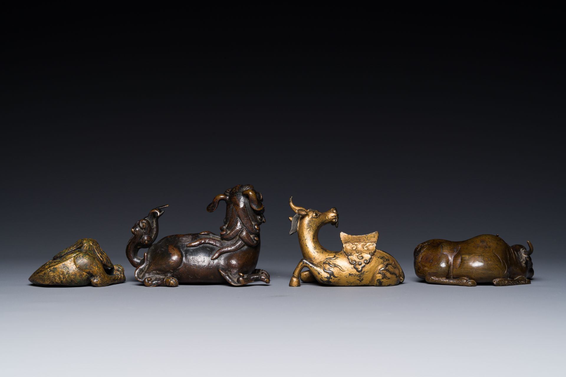 A group of four Chinese gilt bronze paper-weights, Ming/Qing - Image 3 of 7