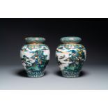 A pair of Japanese Kutani covered vases with landscape design, Meiji, 19th C.