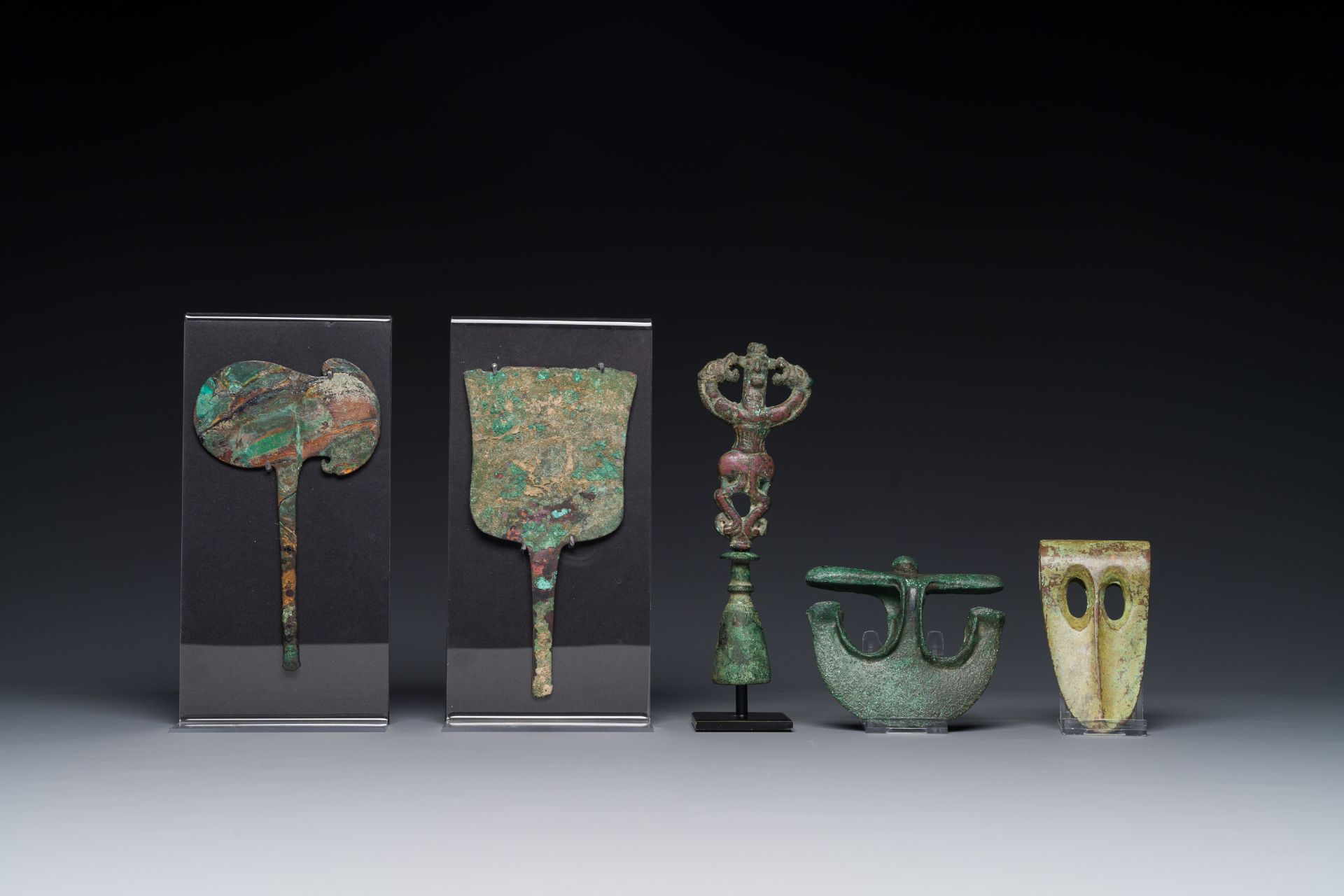 A collection of three bronze axes, a mirror and an anthropomorphic idol with two dragon heads, Luris - Image 6 of 15