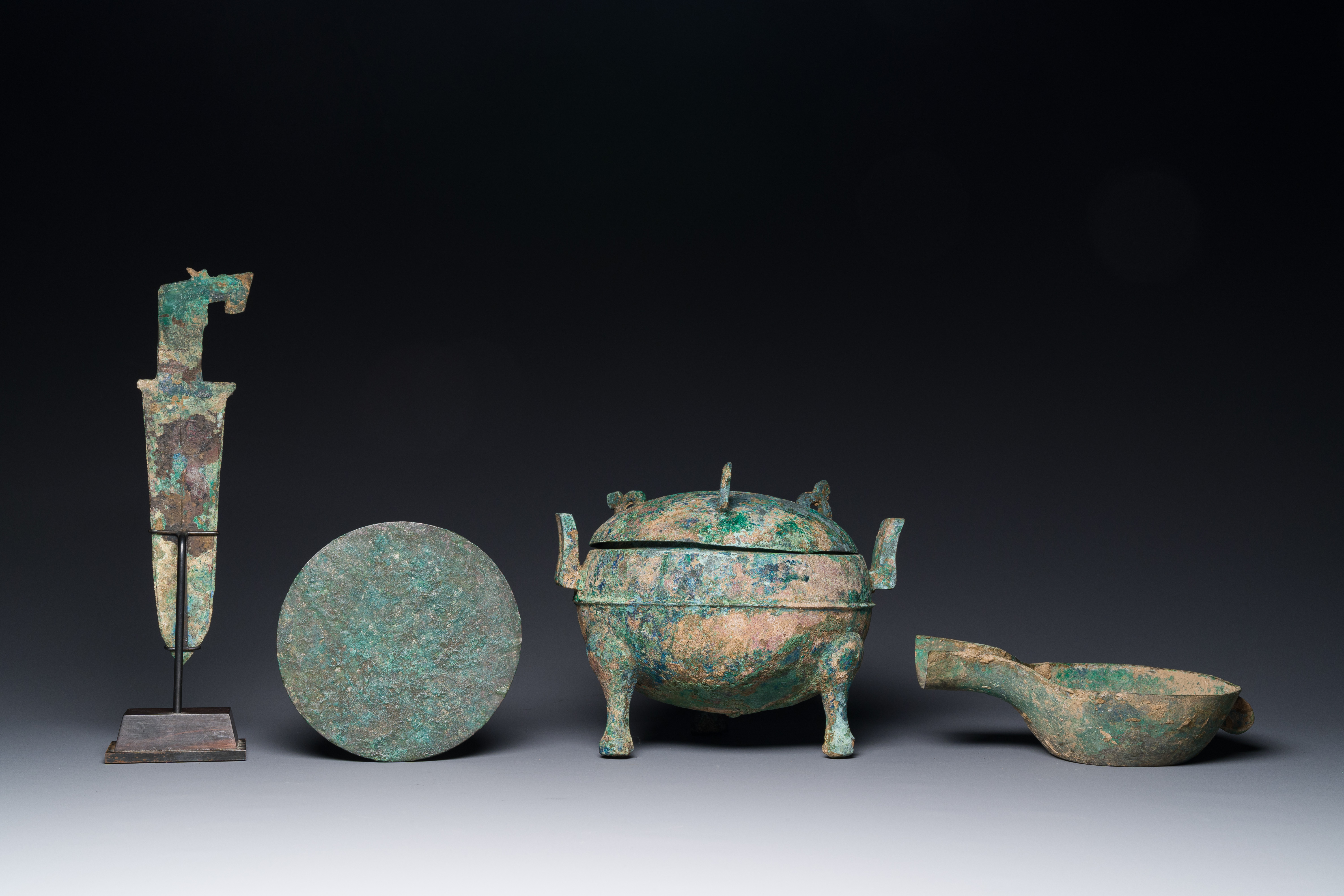 A group of four Chinese archaic bronze wares, late Shang, Warring States and Han - Image 9 of 12