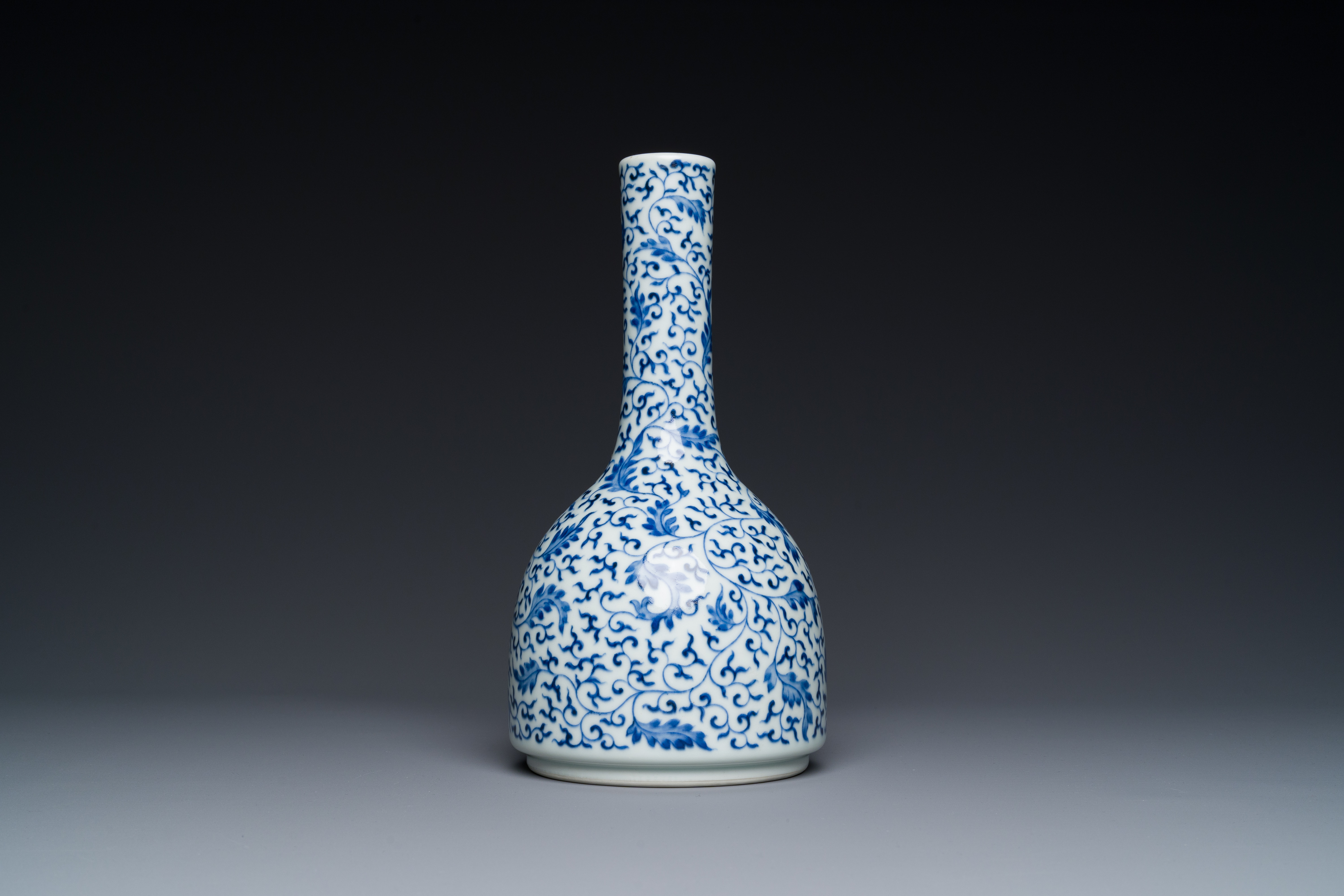 A Chinese blue and white 'lotus scroll' bottle vase, Yongzheng mark and possibly of the period - Image 2 of 6