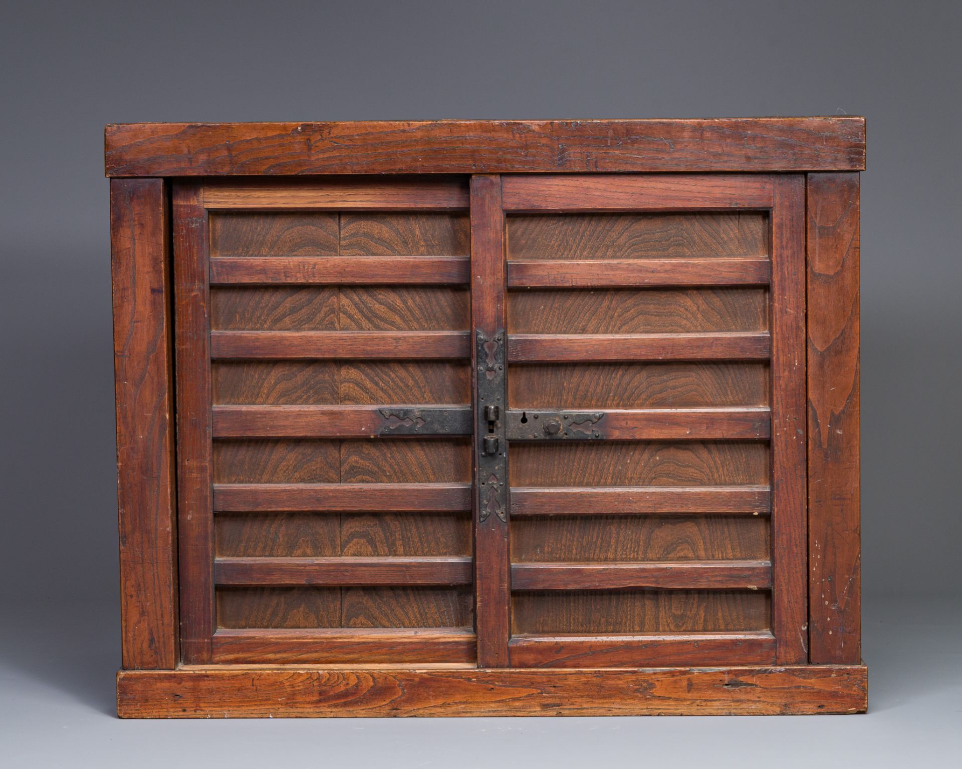 A Japanese wooden tansu chest, 19/20th C. - Image 2 of 6