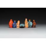 Seven varied Chinese snuff bottles of precious stone, red coral, glass and amber, 19th C.