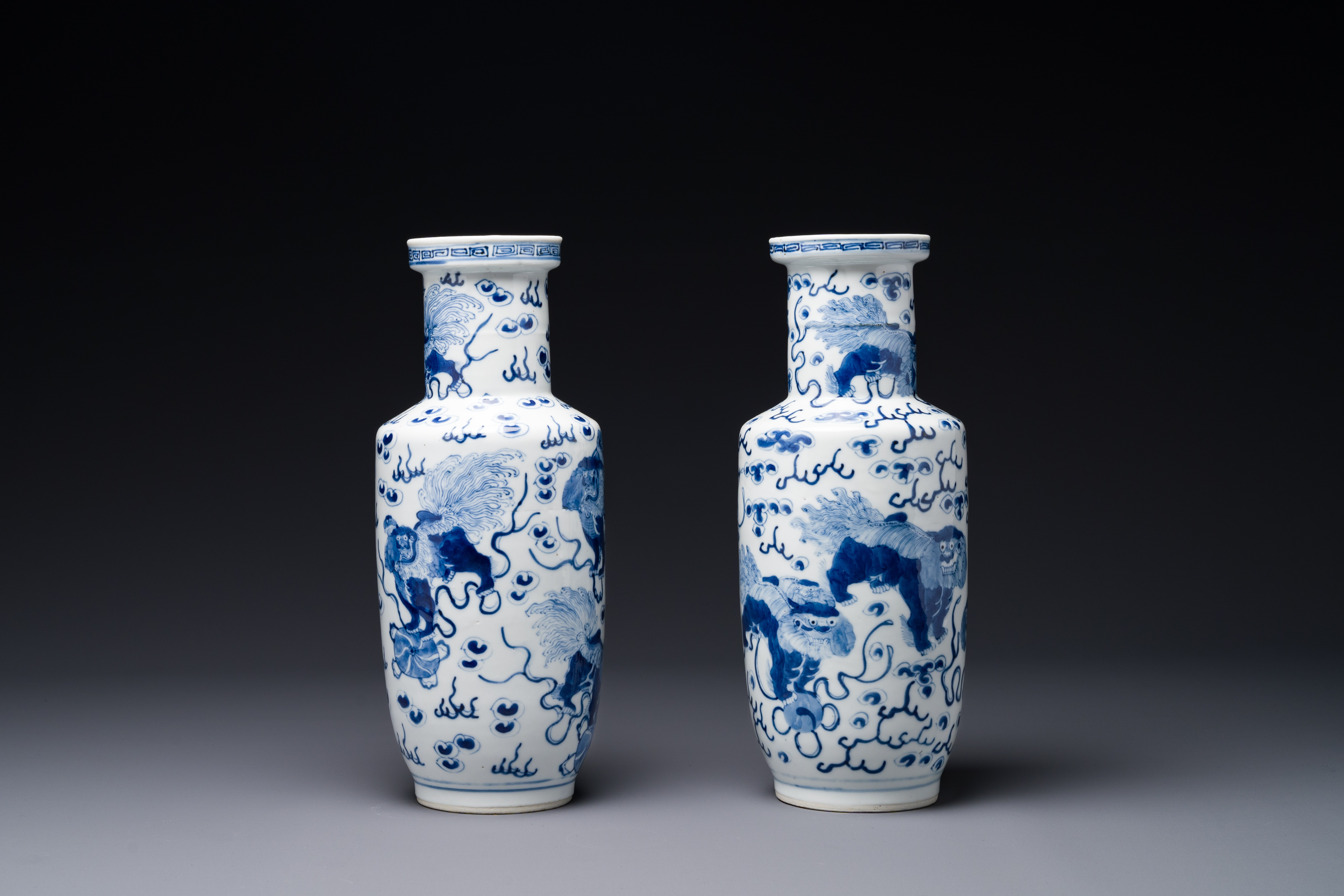 A pair of Chinese blue and white 'Buddhist lion' vases, Kangxi mark, 19th C. - Image 4 of 7