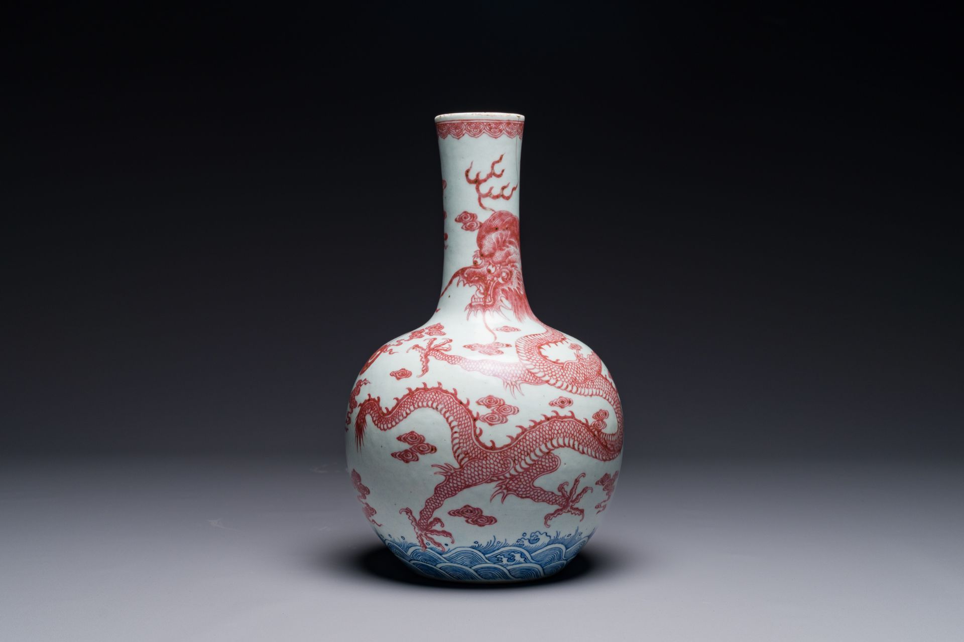 A Chinese blue, white and copper-red 'dragon' tianqiu ping' vase, 18th C.