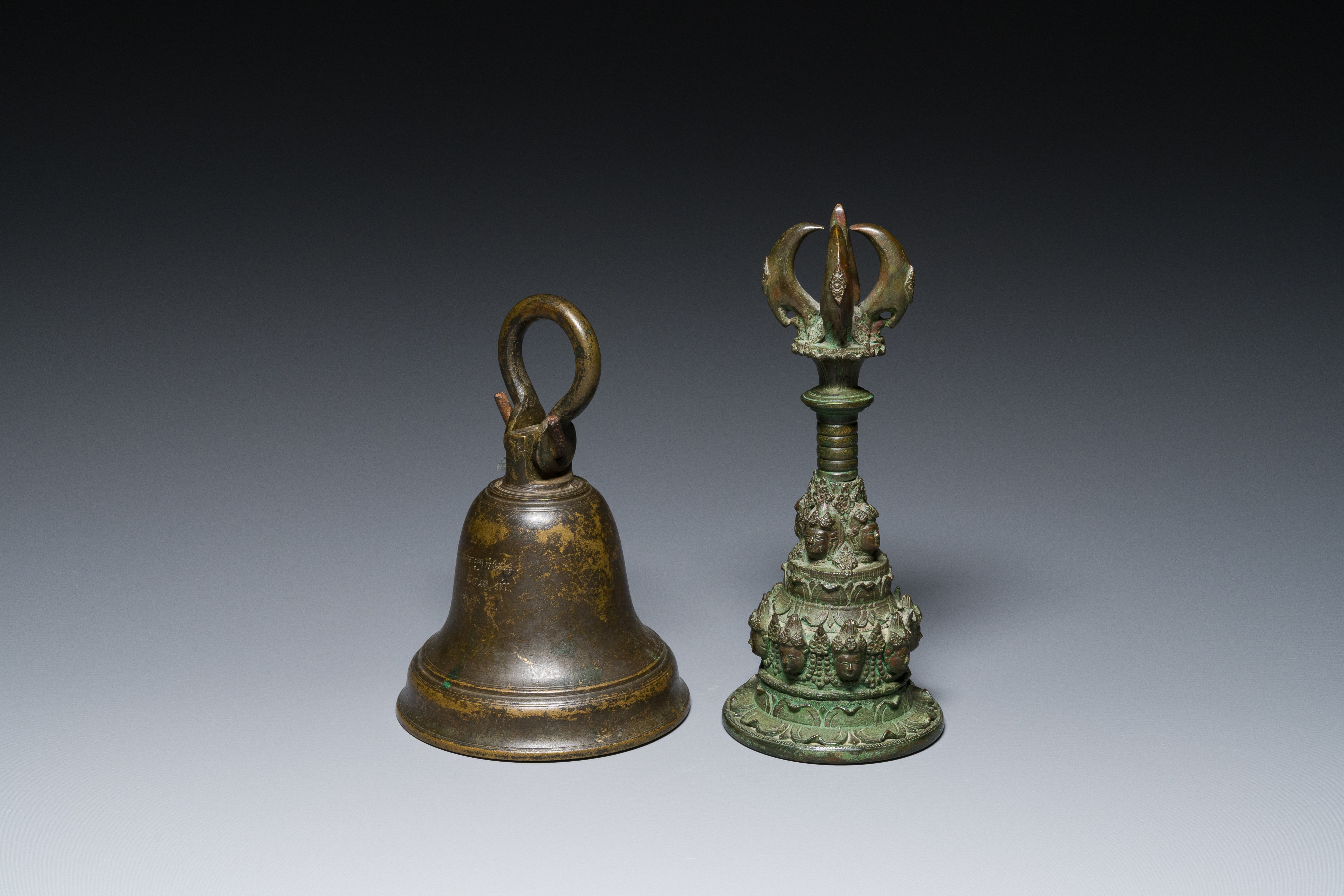 A bronze bell and a ceremonial hand bell, South Asia and Southeast Asia, 19th C. or earlier - Image 3 of 21