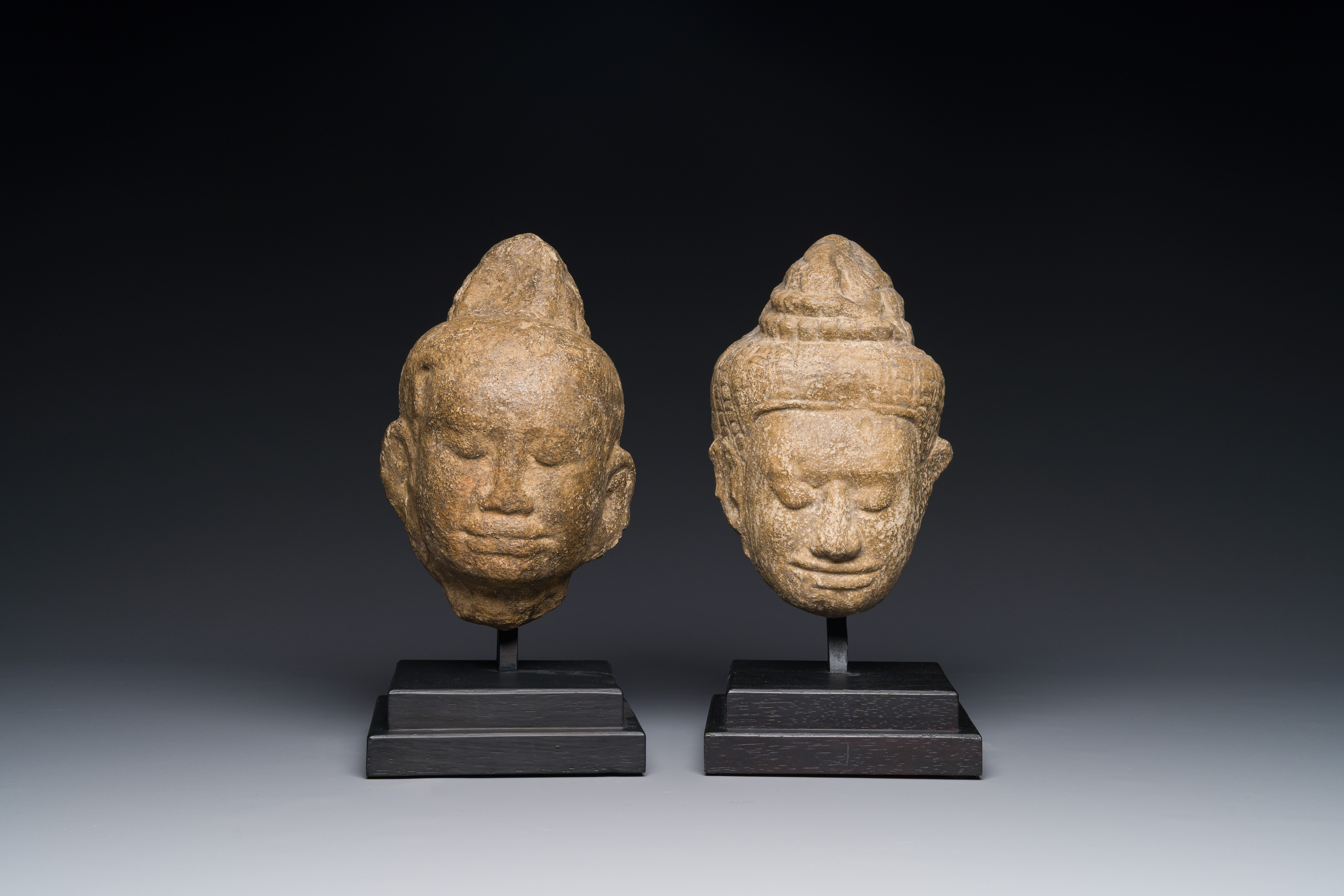 A stone head of Buddha and a sandstone khmer head of a deity, Bayon style, Cambodia, 12/13th C. - Image 6 of 12