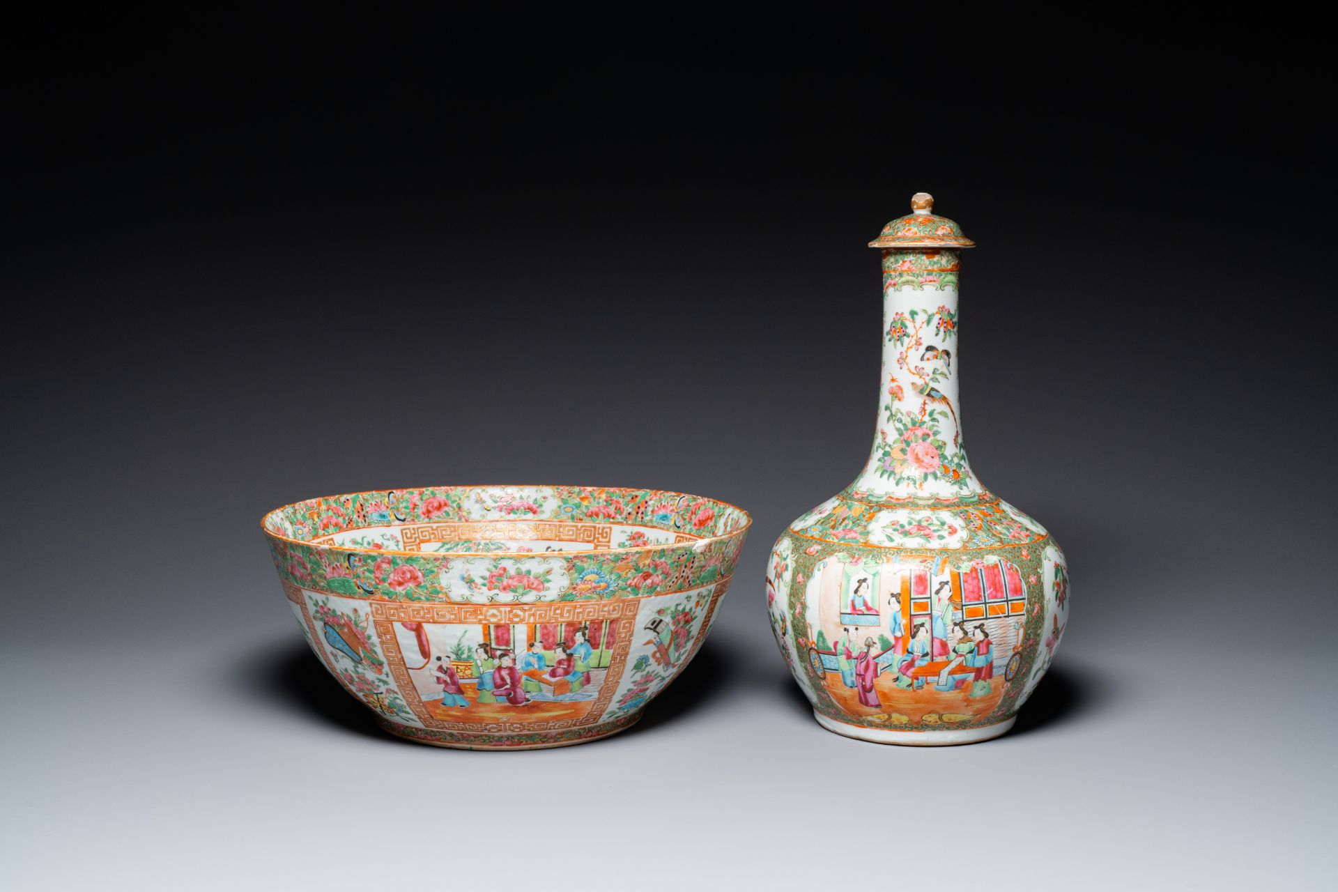 A Chinese Canton famille rose bowl and a covered bottle vase, 19th C.