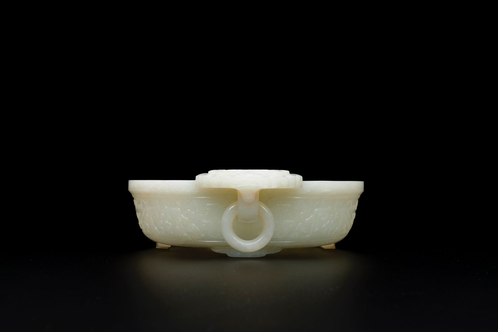 An important Chinese chrysanthemum-shaped very pale celadon jade marriage bowl, 18th C. - Image 5 of 8