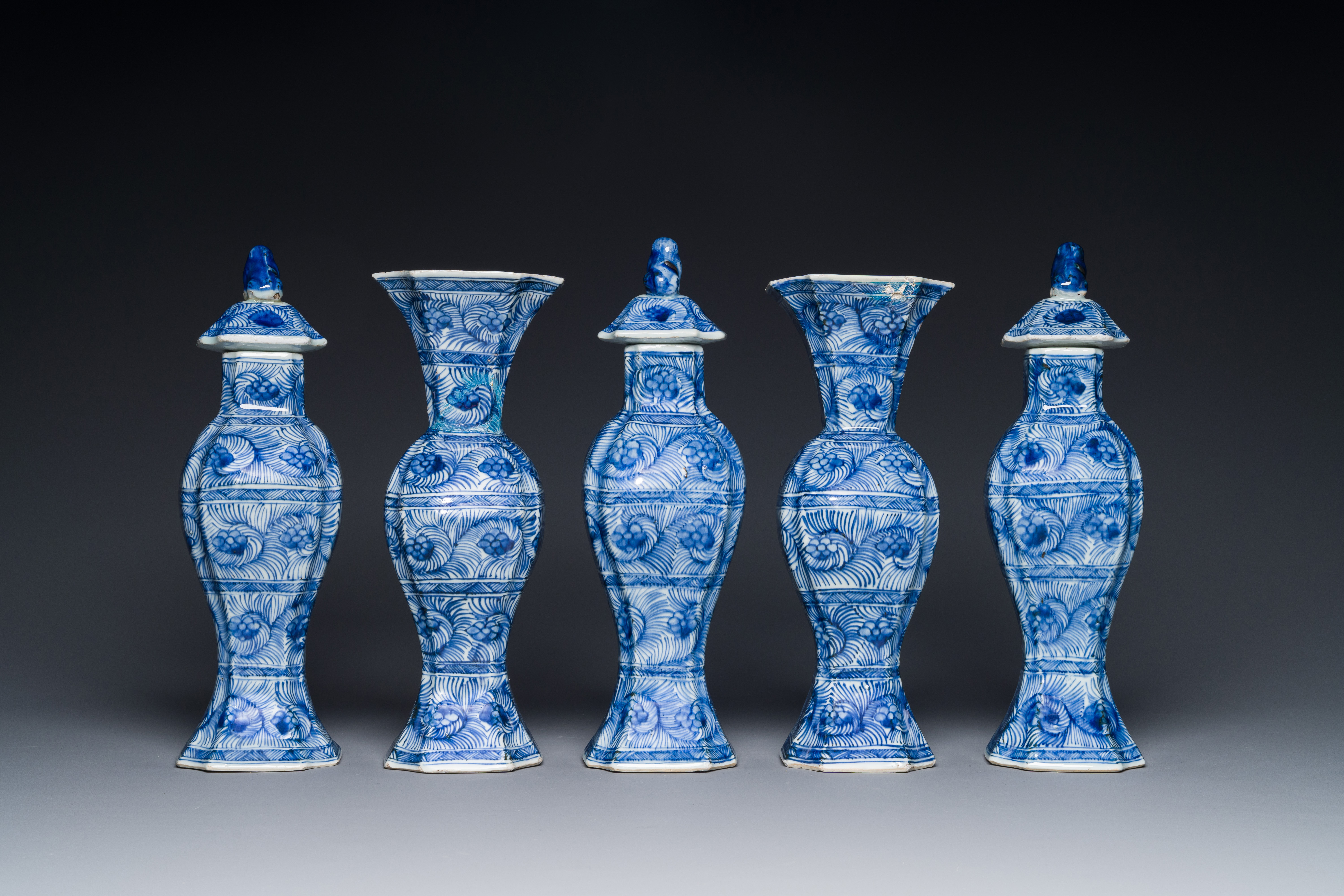 A Chinese blue and white garniture of five vases with floral design, Kangxi - Image 2 of 4