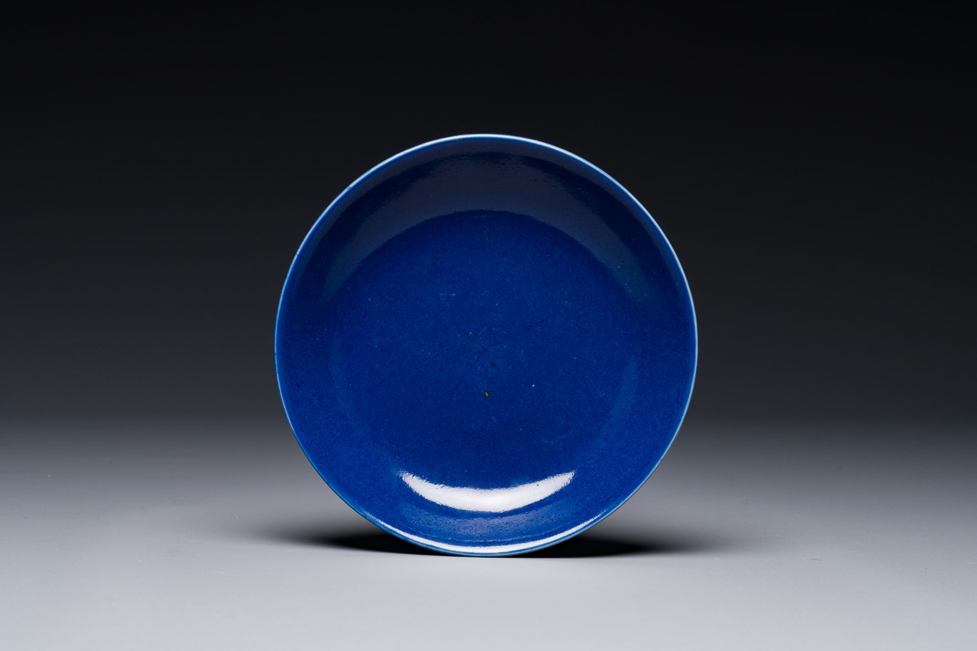 A Chinese powder blue plate, Guangxu mark and of the period