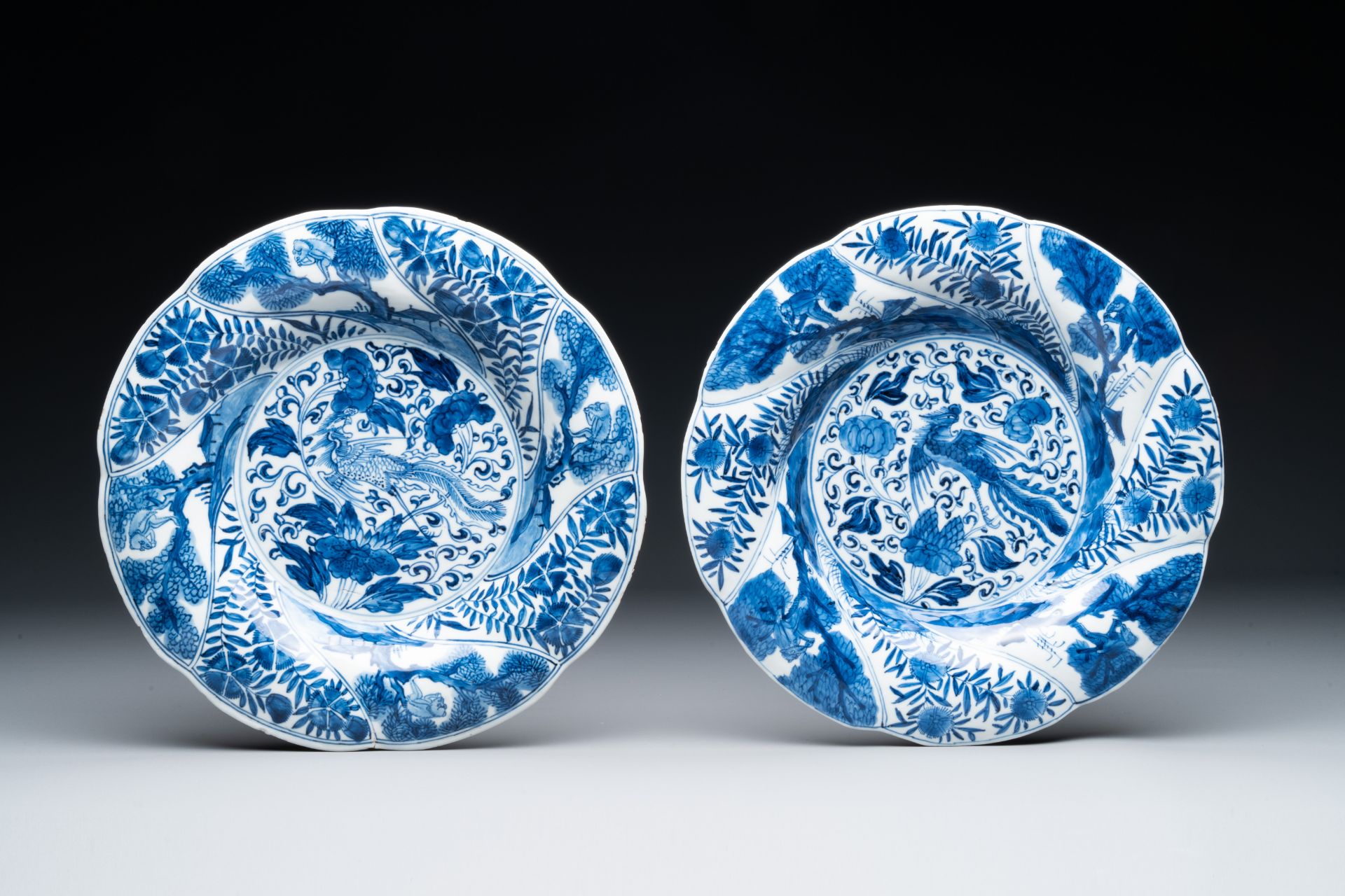 Four Chinese blue and white lobed 'phoenix and monkey' plates, flower mark, Kangxi - Image 3 of 5