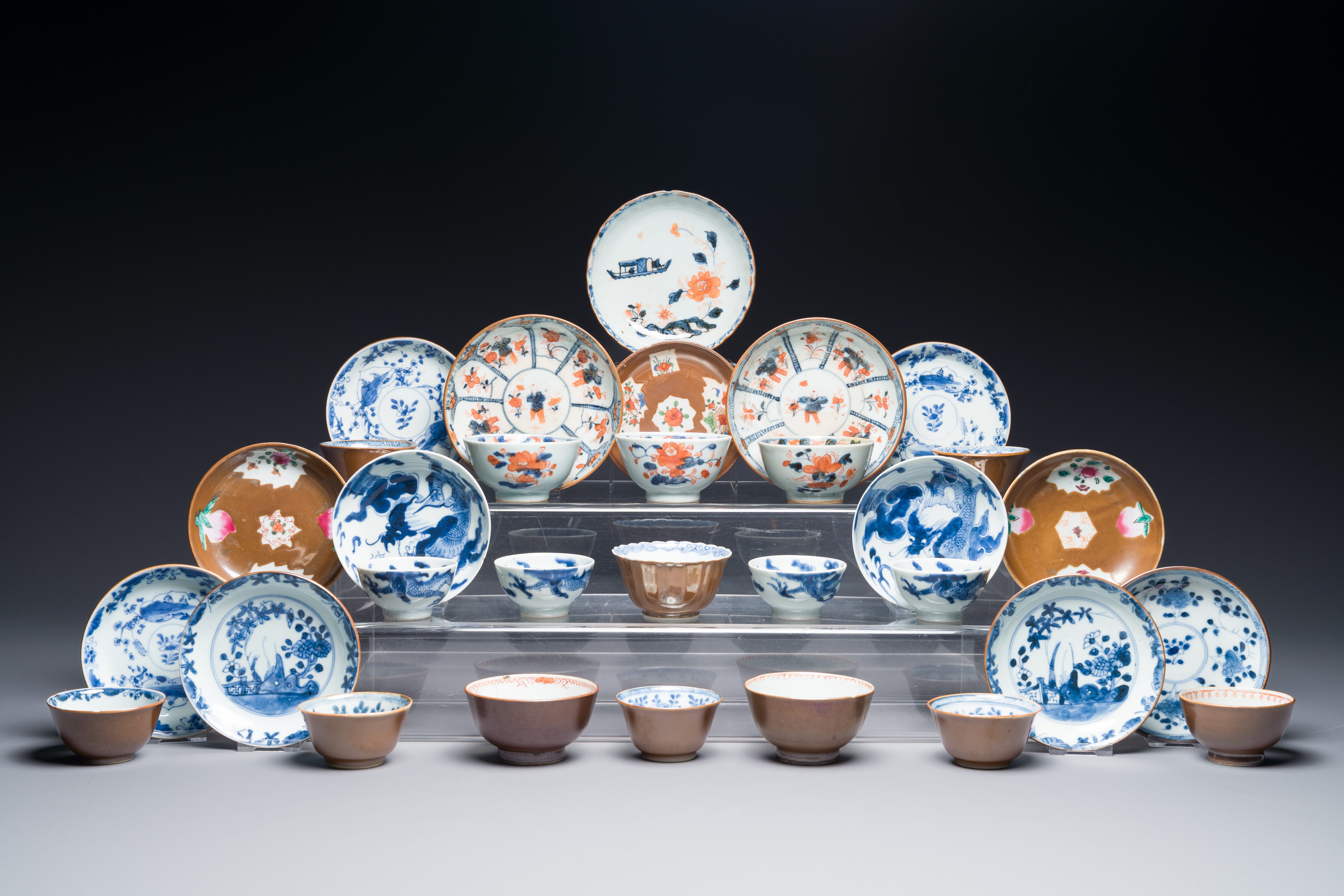 A collection of 17 Chinese porcelain cups and 14 saucers, 18th C.