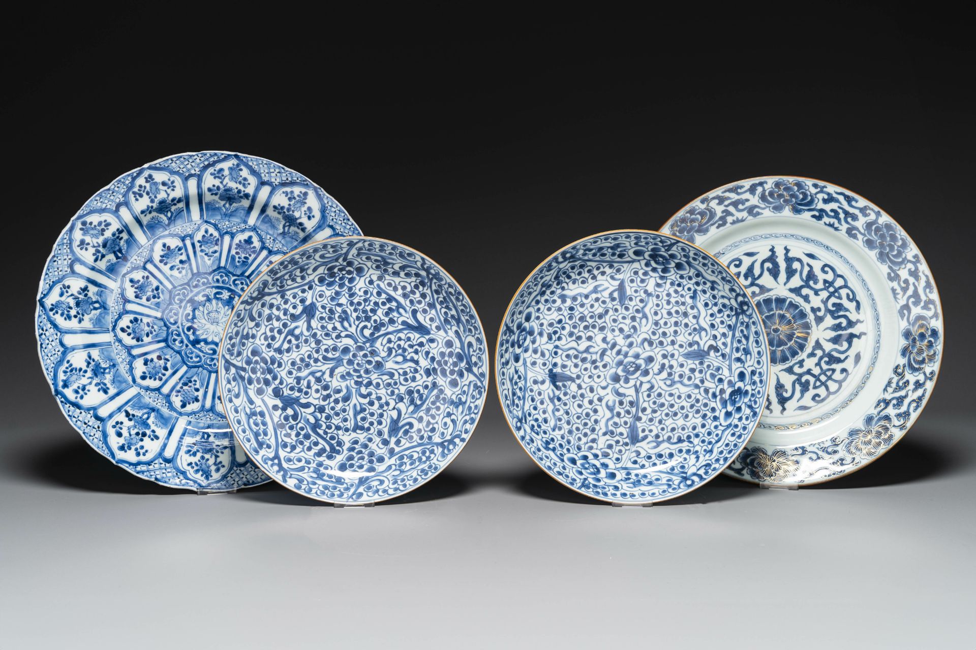 Four Chinese blue and white dishes with floral design, Kangxi/Yongzheng