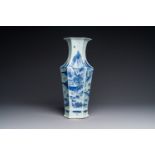 A Chinese blue and white double lozenge-shaped vase with a mountainous river landscape, 19th C.