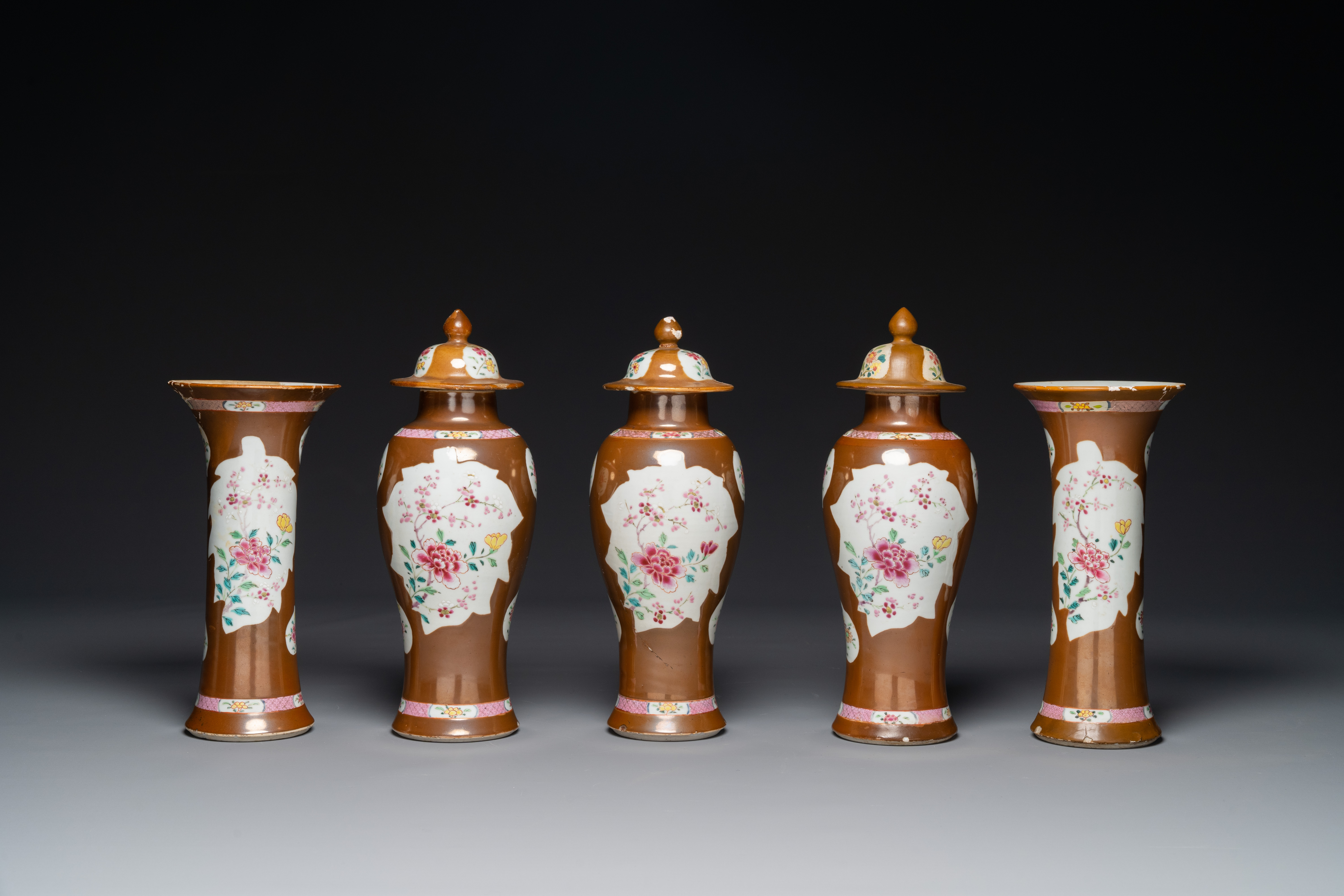 A Chinese capucin-brown-ground famille rose garniture of five vases with floral design, Qianlong - Image 2 of 7