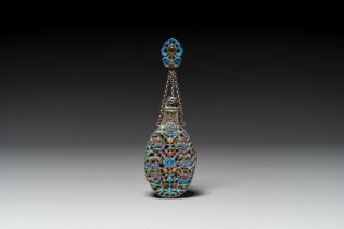 A Chinese openworked and partly enamelled silver bottle, 19th C.