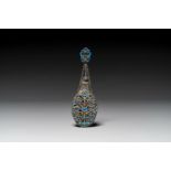 A Chinese openworked and partly enamelled silver bottle, 19th C.