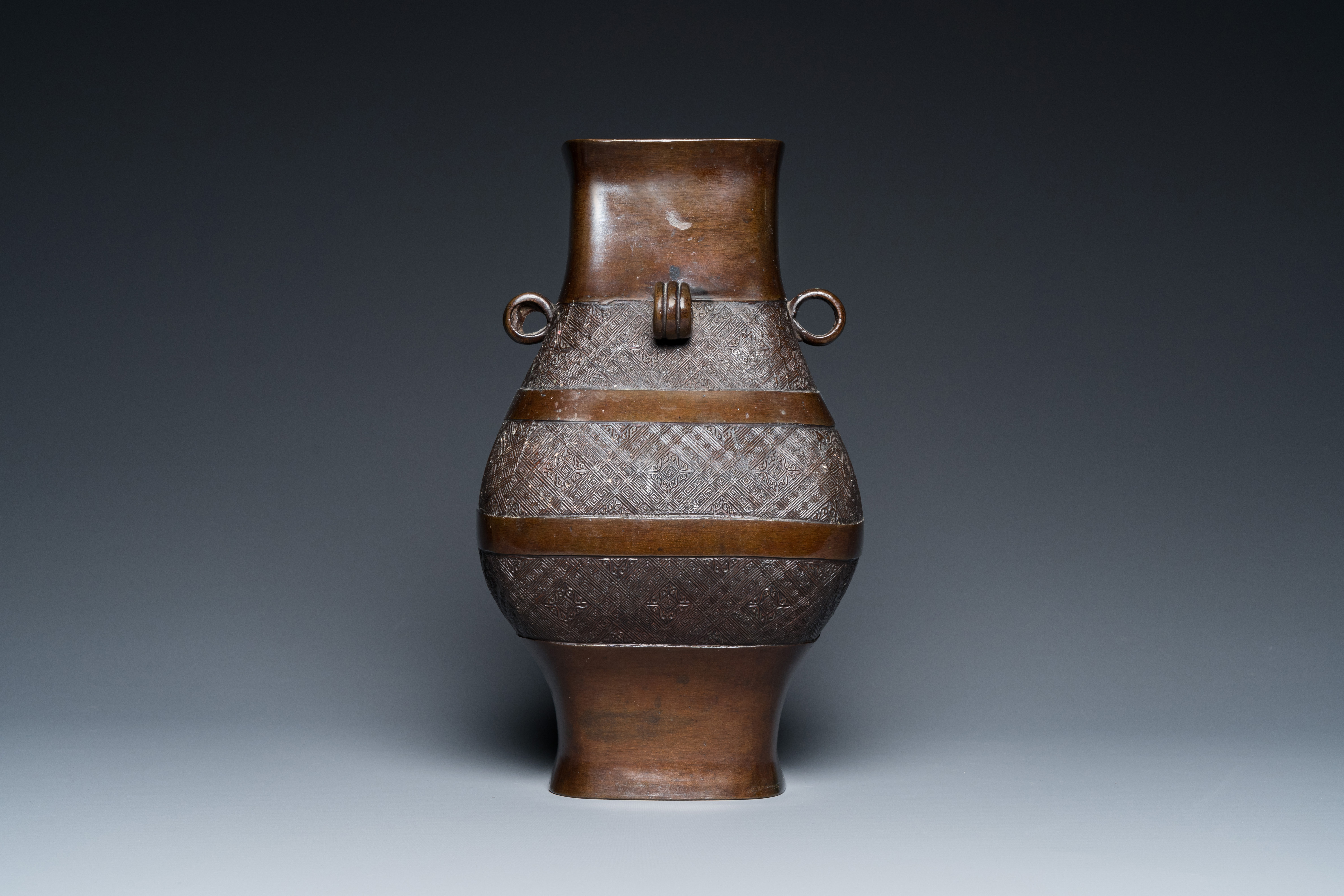 A Chinese archaistic bronze 'fanghu' vase, Ming - Image 16 of 24