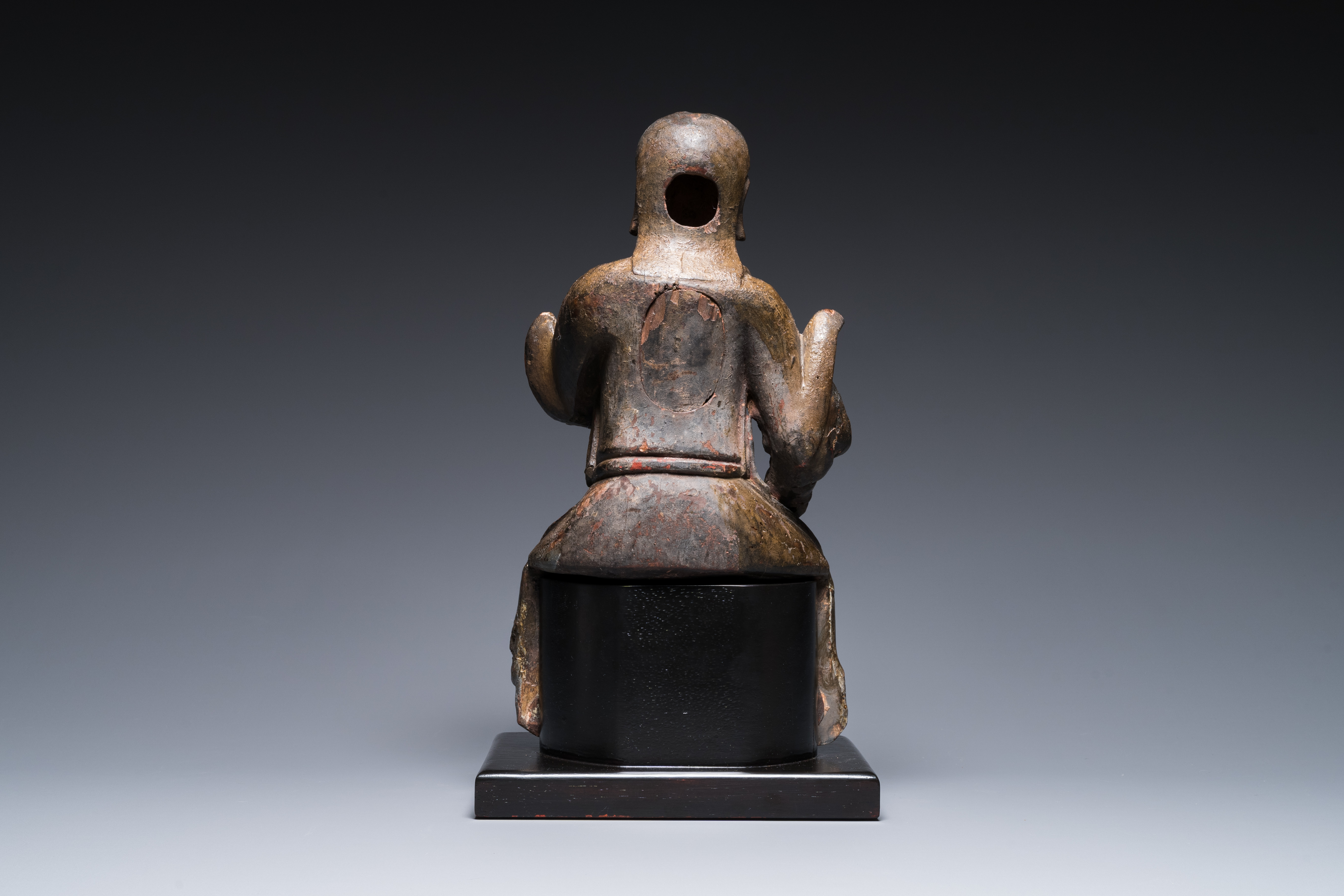 A Chinese lacquered and polychromed wood sculpture of a Buddhist guardian, Ming - Image 4 of 8