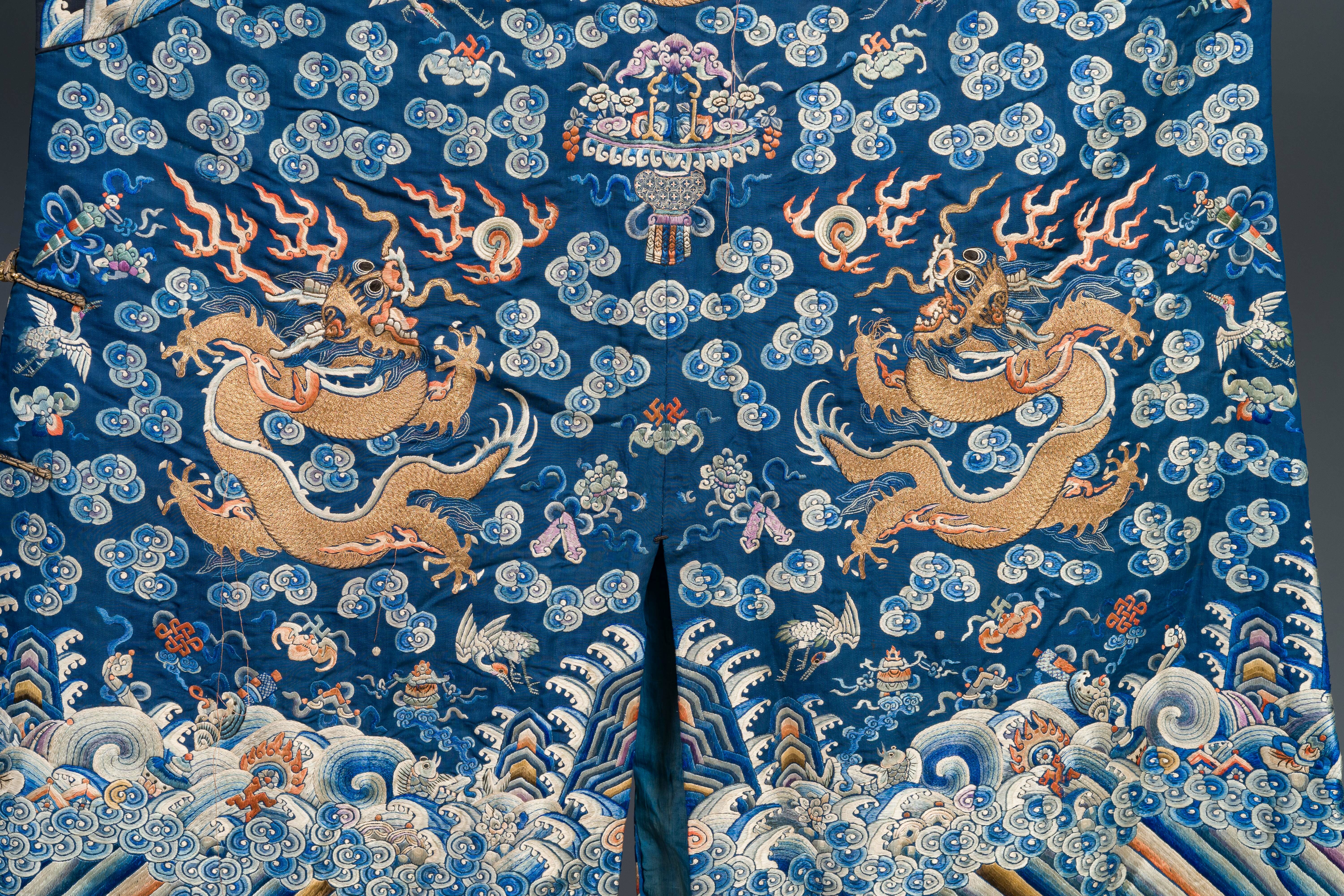 A Chinese gold thread embroidered blue-ground silk 'dragon' robe, 19th C. - Image 6 of 7