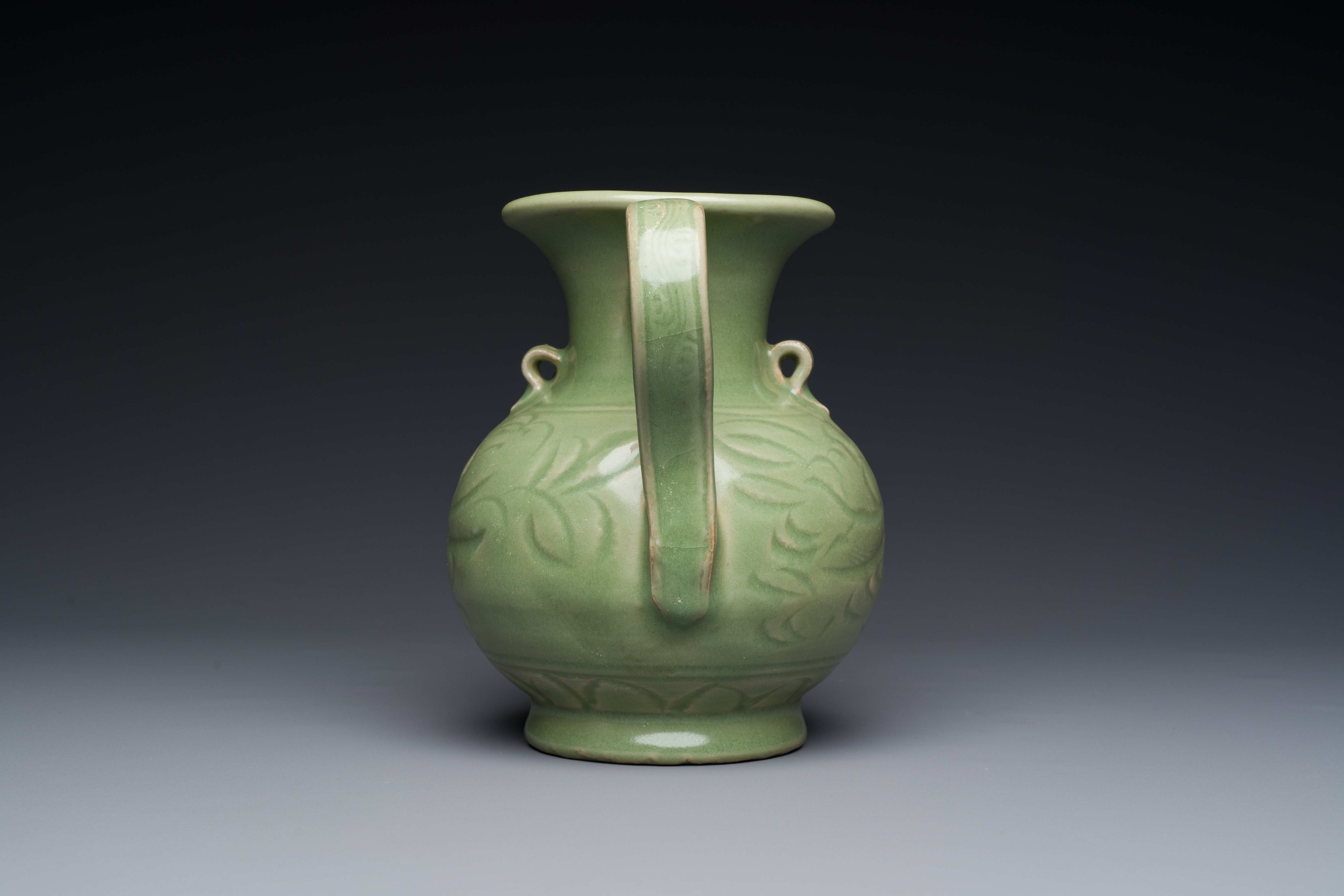 A Chinese Longquan celadon wine ewer with anhua design, Yuan/Ming - Image 3 of 7