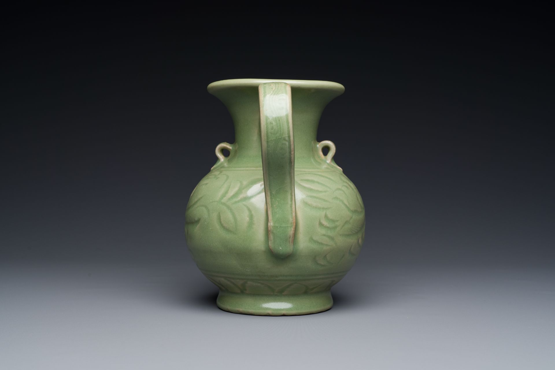 A Chinese Longquan celadon wine ewer with anhua design, Yuan/Ming - Image 3 of 7