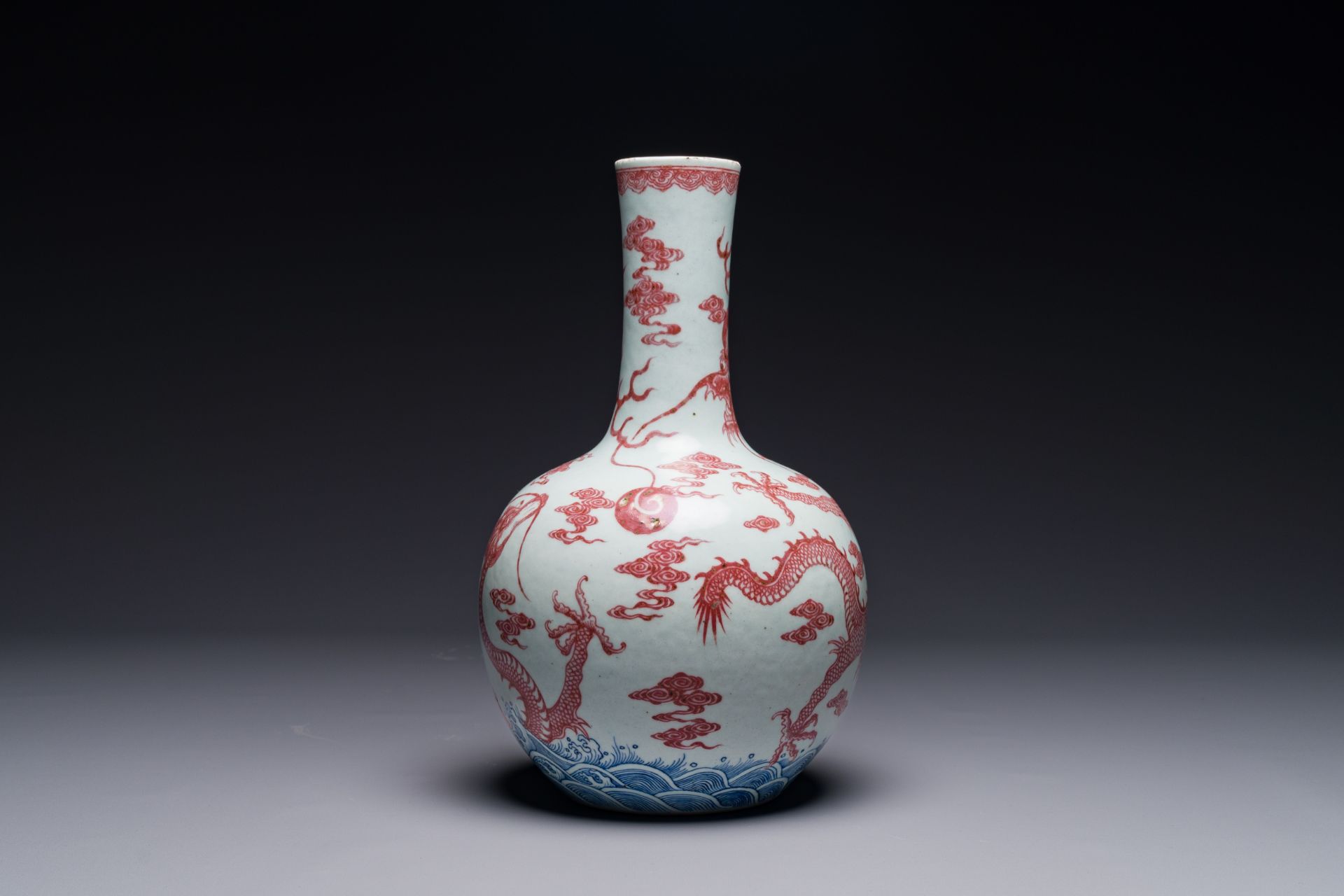 A Chinese blue, white and copper-red 'dragon' tianqiu ping' vase, 18th C. - Image 5 of 7