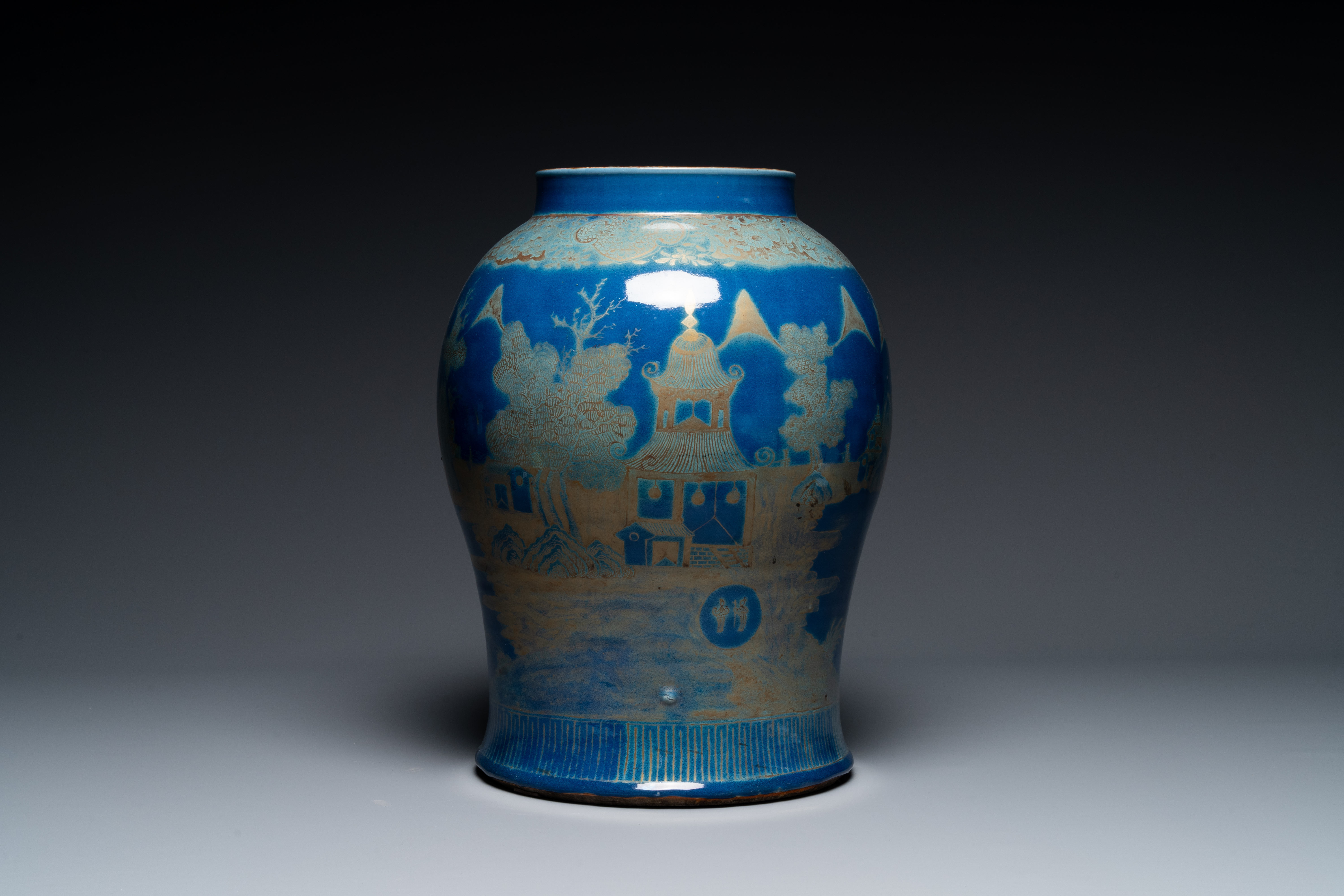 A Chinese gilt-decorated powder-blue vases with landscape design, Qianlong/jiaqing