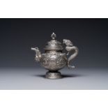 A fine Tibetan silver plated 'bajixiang' teapot, 19th C.