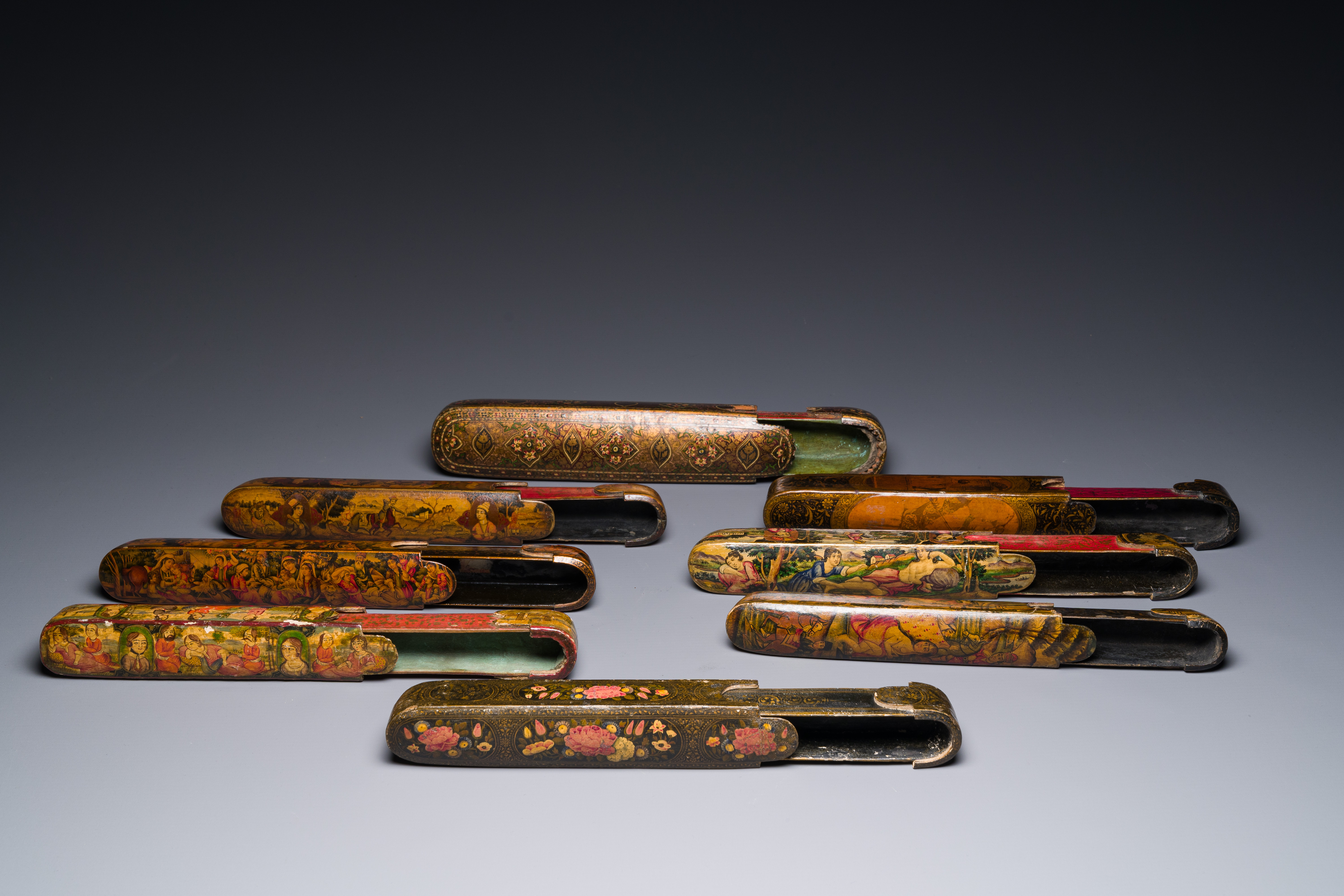 A collection of eight lacquered papier-mache pen boxes or qalamdans, Qajar, Persia, 19th C. - Image 2 of 2