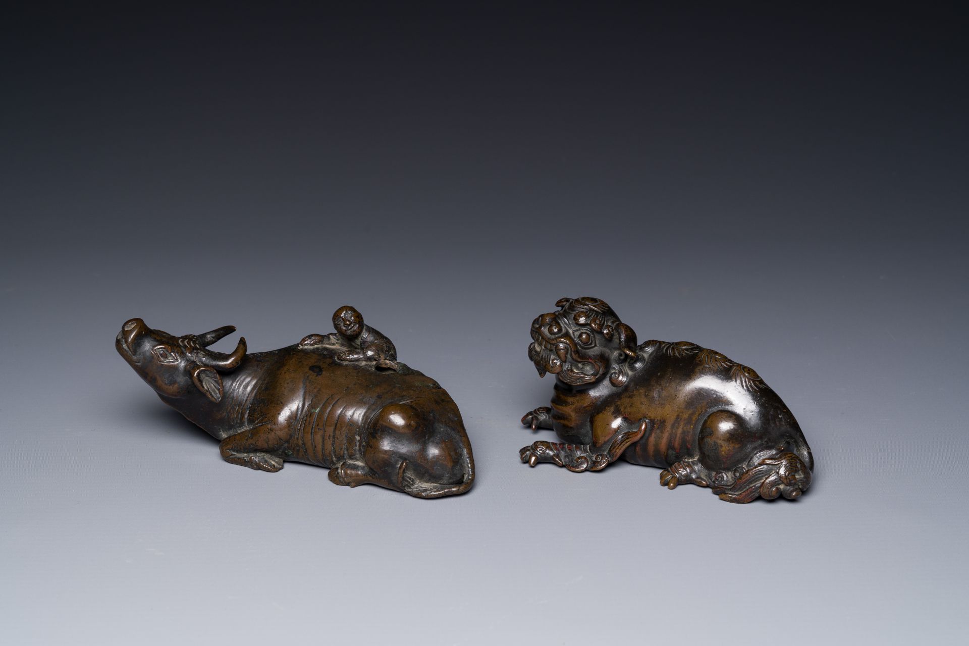 Two Chinese bronze water droppers, Ming/Qing