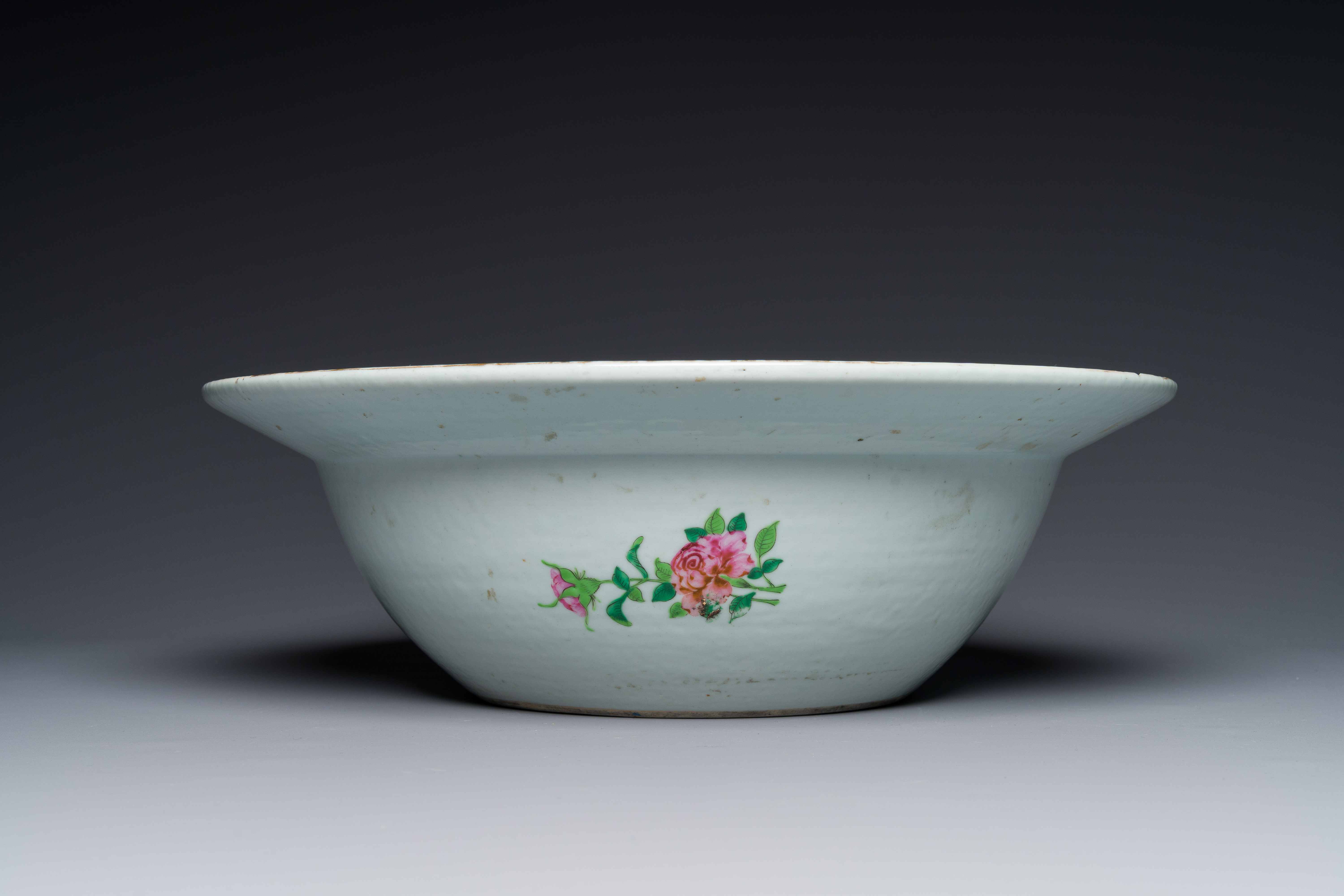 A large Chinese Canton famille rose 'Qi Lin Song Zi' basin, 19th C. - Image 3 of 5