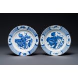 A pair of Chinese blue and white 'Buddhist lion' plates, ding mark, Kangxi