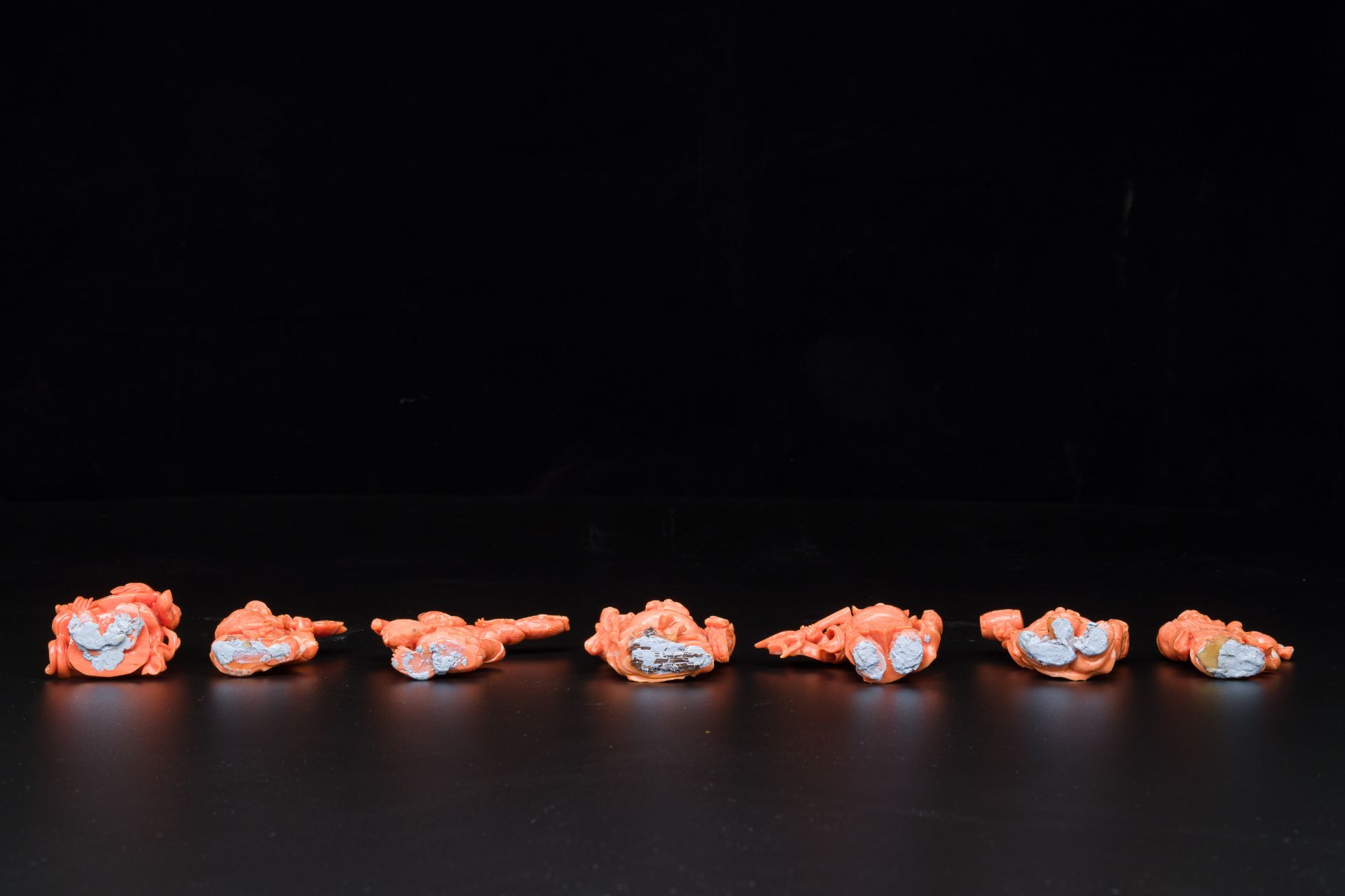 A set of seven Chinese red coral figures on wooden stand, 19/20th C. - Image 3 of 3