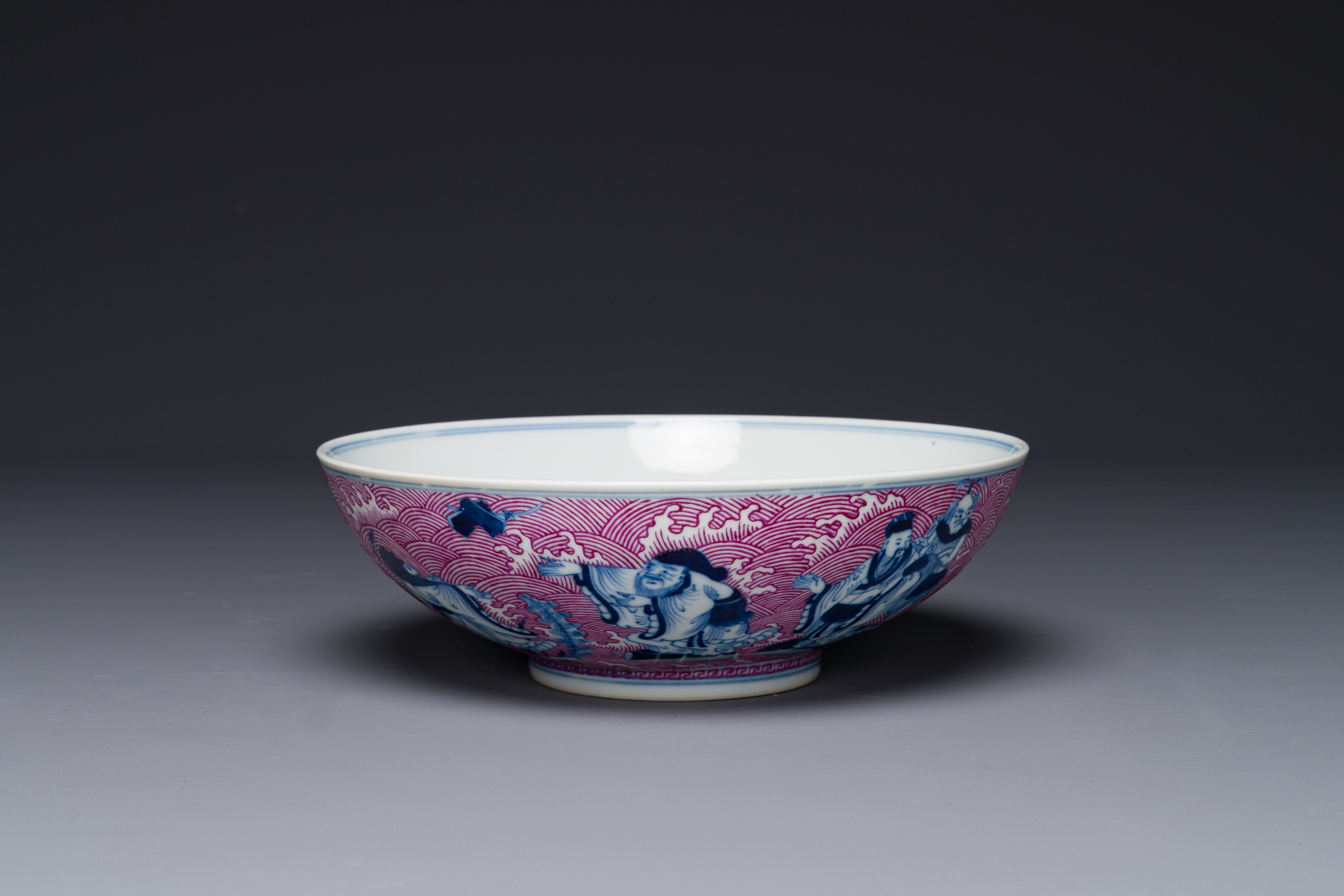 A Chinese blue, white and puce-enamelled 'Eight Immortals' bowl, Guangxu mark and of the period - Image 4 of 8