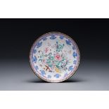 A Chinese Canton enamel plate with floral design, Yongzheng